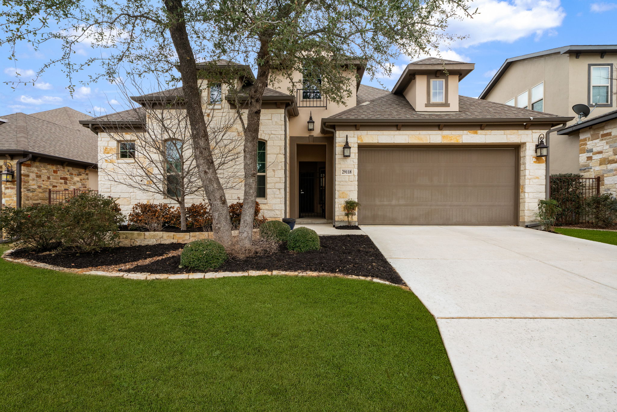 Front exterior of 29118 Bambi Place in gated Balcones Creek, Boerne TX