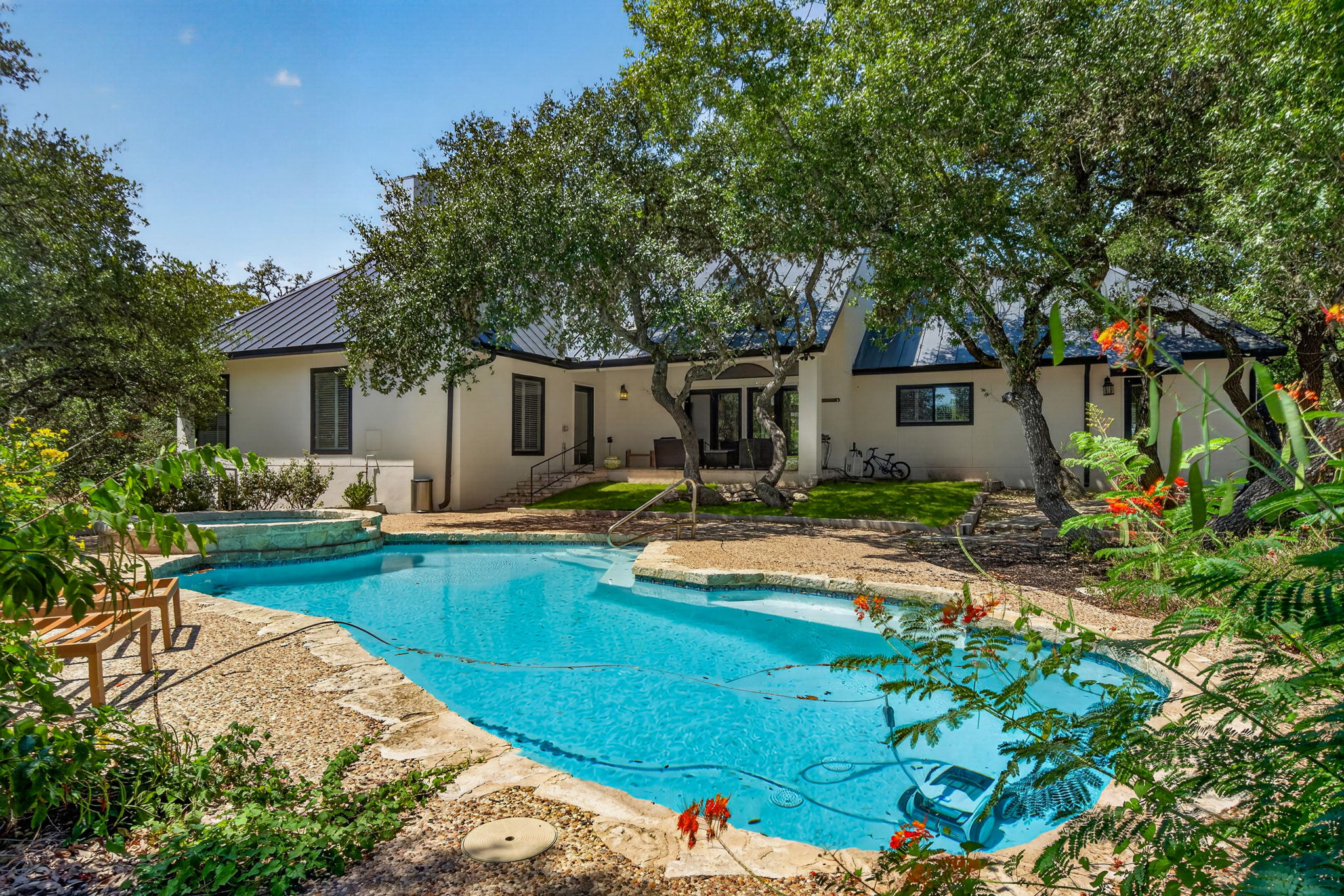 Featured Listing: 29440 Red Bud Hill, Fair Oaks Ranch TX 78015 – Beautifully Updated 1.15-Acre Cul-de-Sac Estate with Pool, Outdoor Kitchen & All Bedrooms Downstairs in Raintree Woods header image.