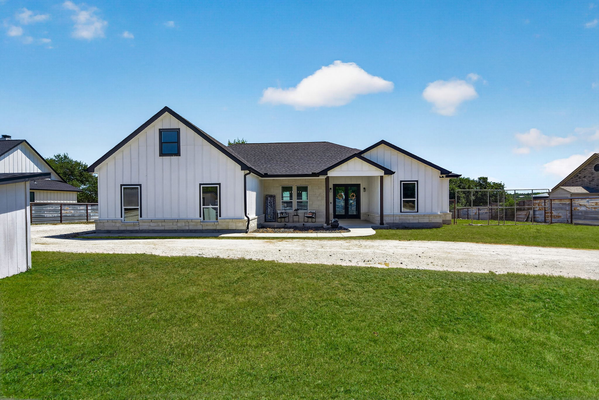 Featured Listing: 335 Saddle Mountain Dr, Boerne TX 78006 – Contemporary 2021-Built Home on 1.52 Acres with All Bedrooms Downstairs in The Crossing at Hidden Lake header image.