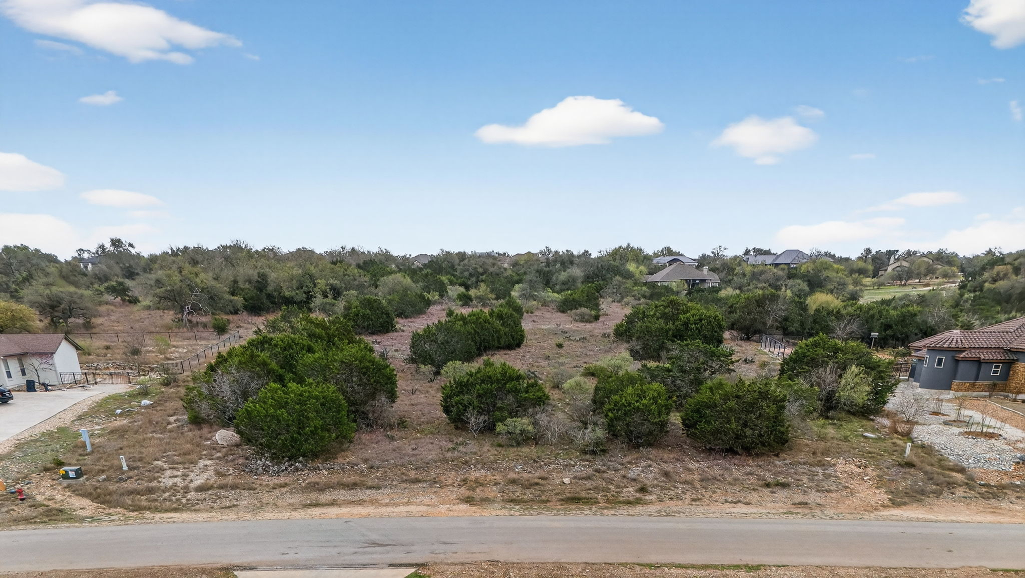 Featured Listing: 1634 Decanter, New Braunfels TX 78132 – 2.29 Acres of Hill Country Beauty with Resort-Style Living in Prestigious Vintage Oaks at the Vineyard header image.