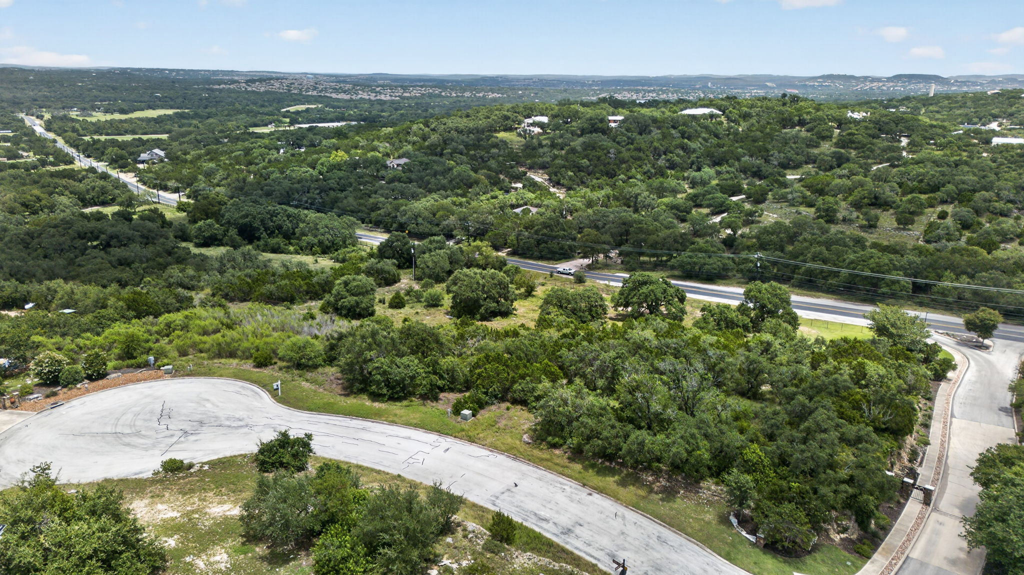 Featured Listing: 23906 Carina Canyon, San Antonio TX 78255 – Over an Acre on a Cul-de-Sac with Hill Country Views in the Prestigious Gated Canyons at Scenic Loop header image.