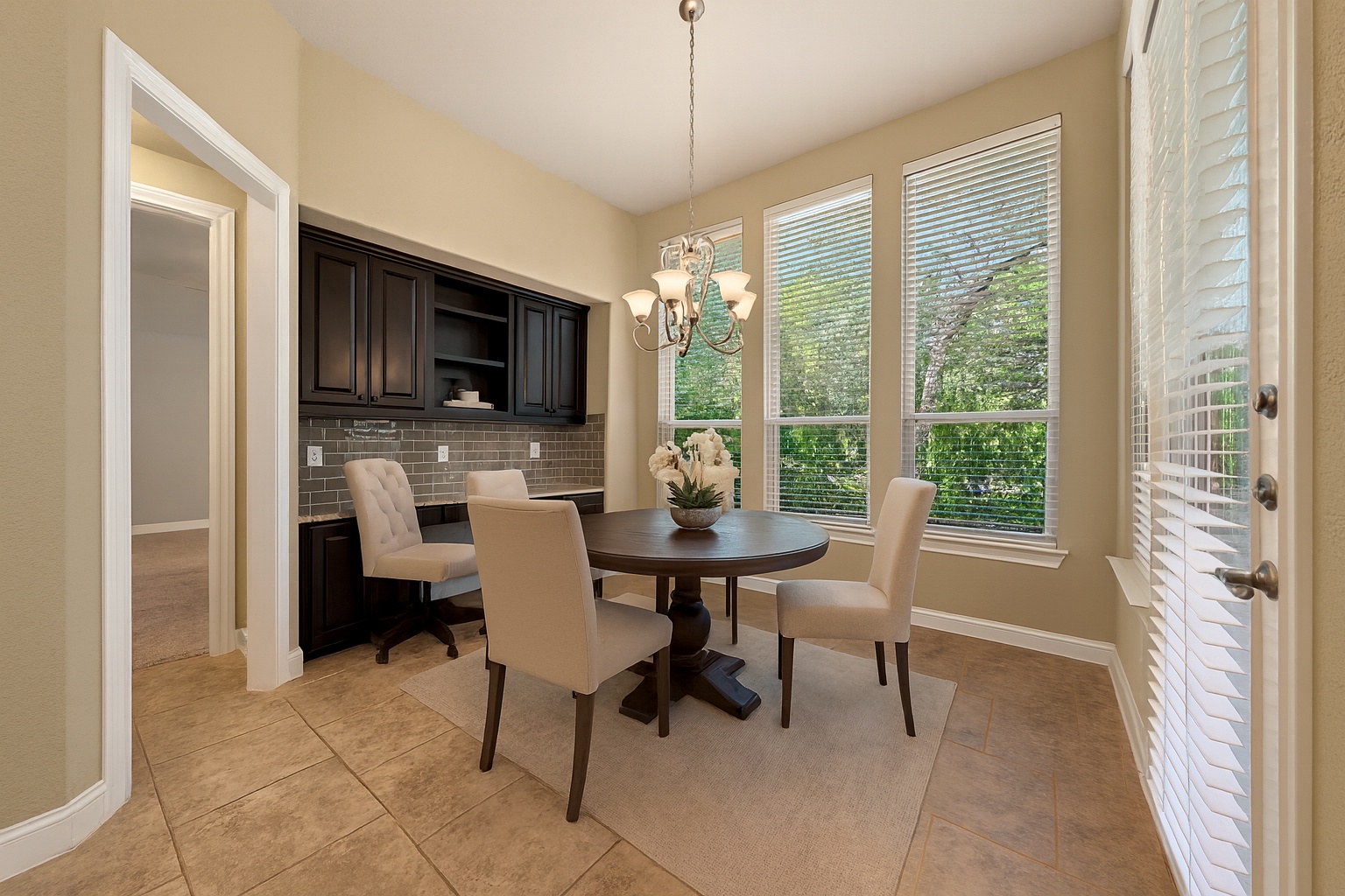 29014 Voges Ave Boerne TX open concept living kitchen gas fireplace soaring ceilings Balcones Creek Highland Home interior