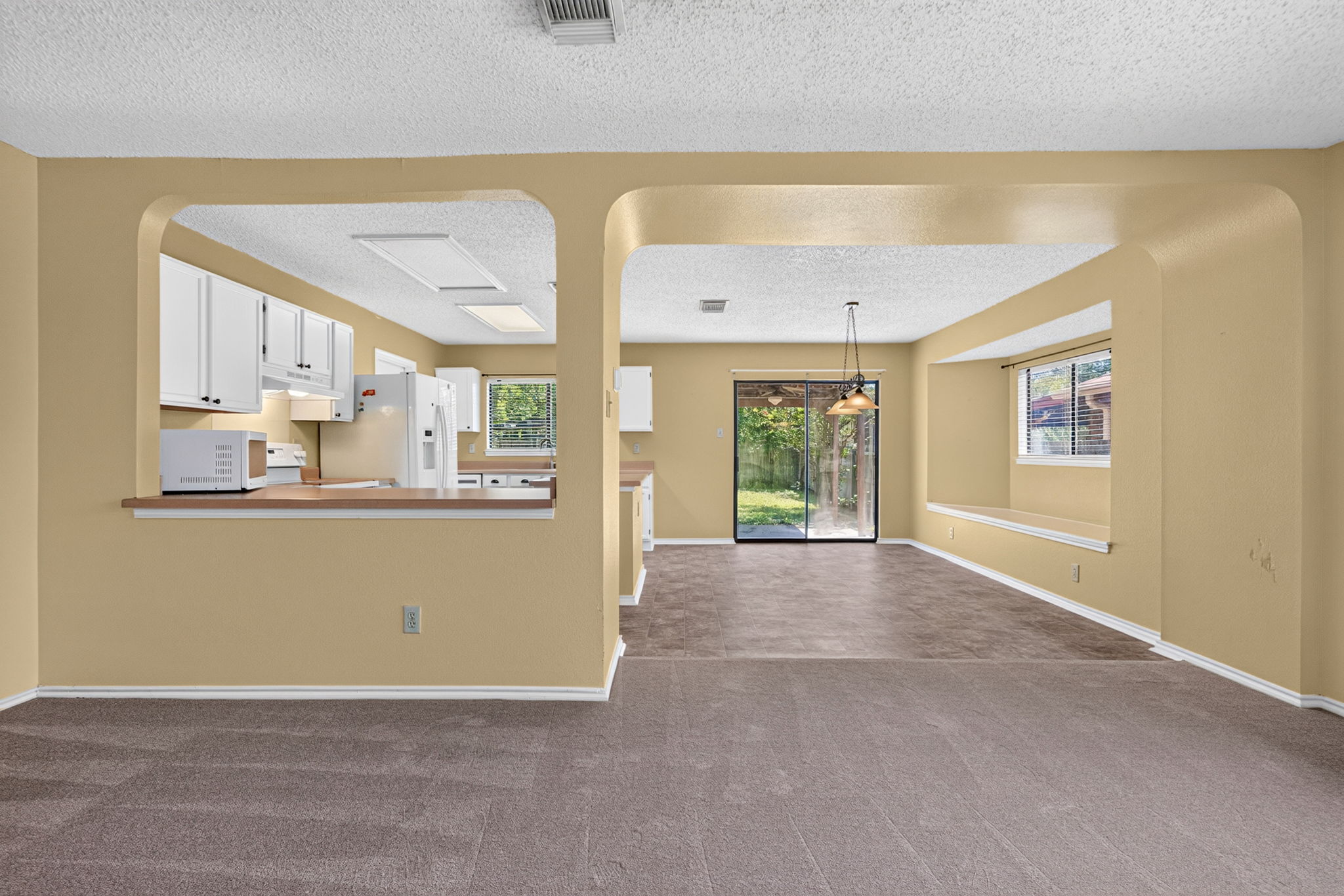 6350 Regency Ln San Antonio TX 78249 covered patio fenced backyard mature trees Regency Meadow outdoor living