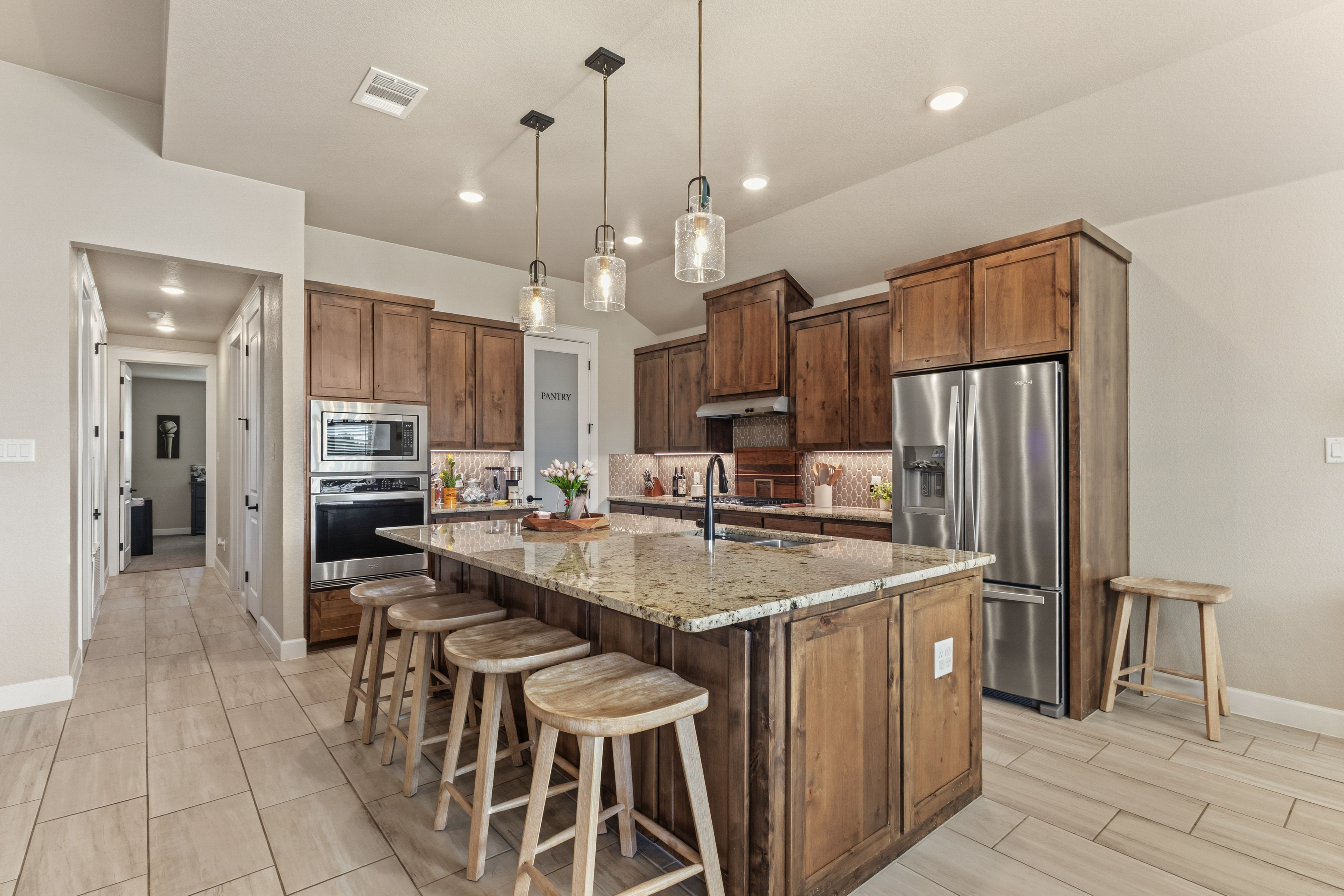 3015 Whitetail Trl Nolanville TX covered patio professional landscaping Bella Charca outdoor living Texas sunset