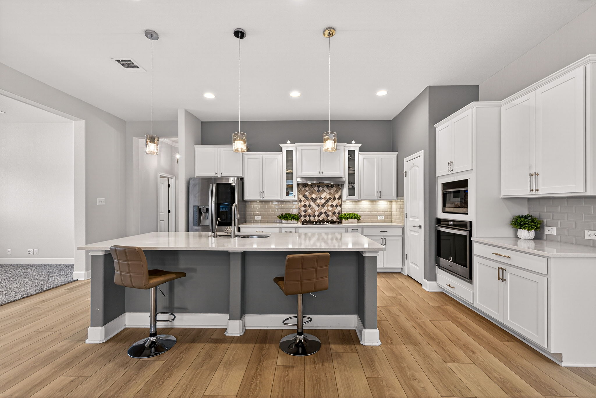 122 Noble Woods Boerne TX gourmet kitchen quartz countertops open concept single-story The Woods of Boerne interior