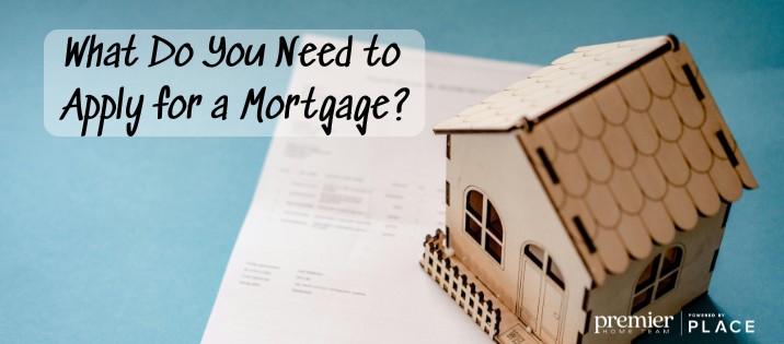 model house on piece of paper, with text 