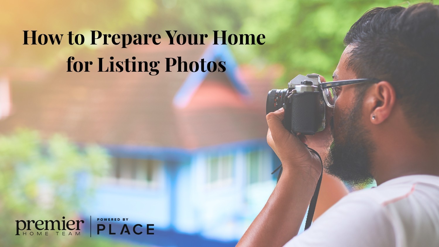 A person with a camera photographs a house, set against a lush, green backdrop. Text reads 