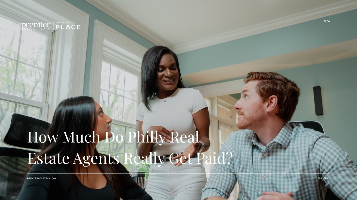 Three diverse real estate professionals in a bright Philadelphia office discussing career growth, featuring the overlay text 