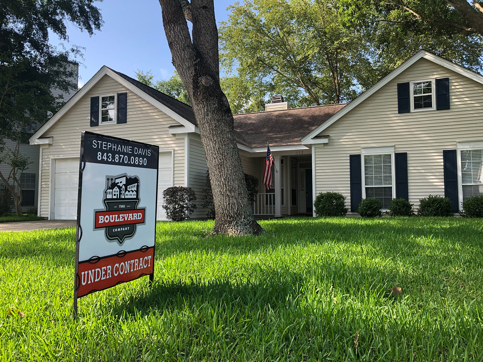 Single story home with a sign that says Under Contract
