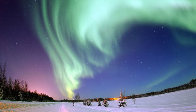 View the Northern Lights in Anchorage, AK header image.
