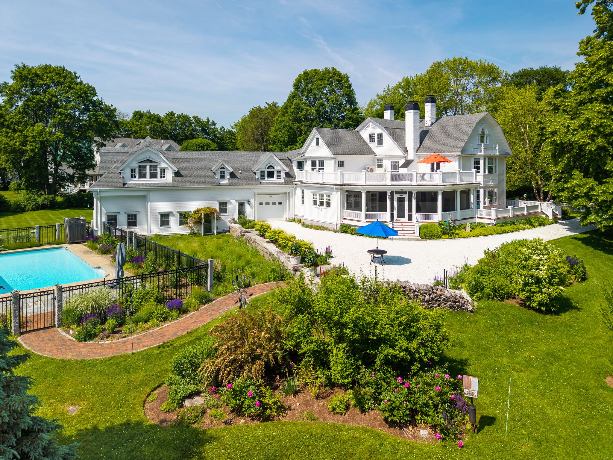 An exterior view of 633 Central Road in Rye Beach just moments from Abenaqui Country Club—where coastal living, natural surroundings, and understated design come together.