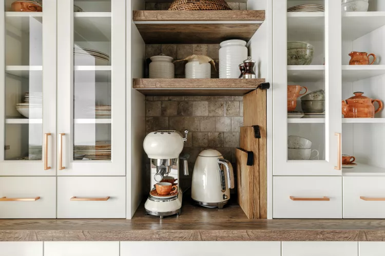How to Organize Your Kitchen Cabinets—and Keep Them Organized—According to Pros header image.