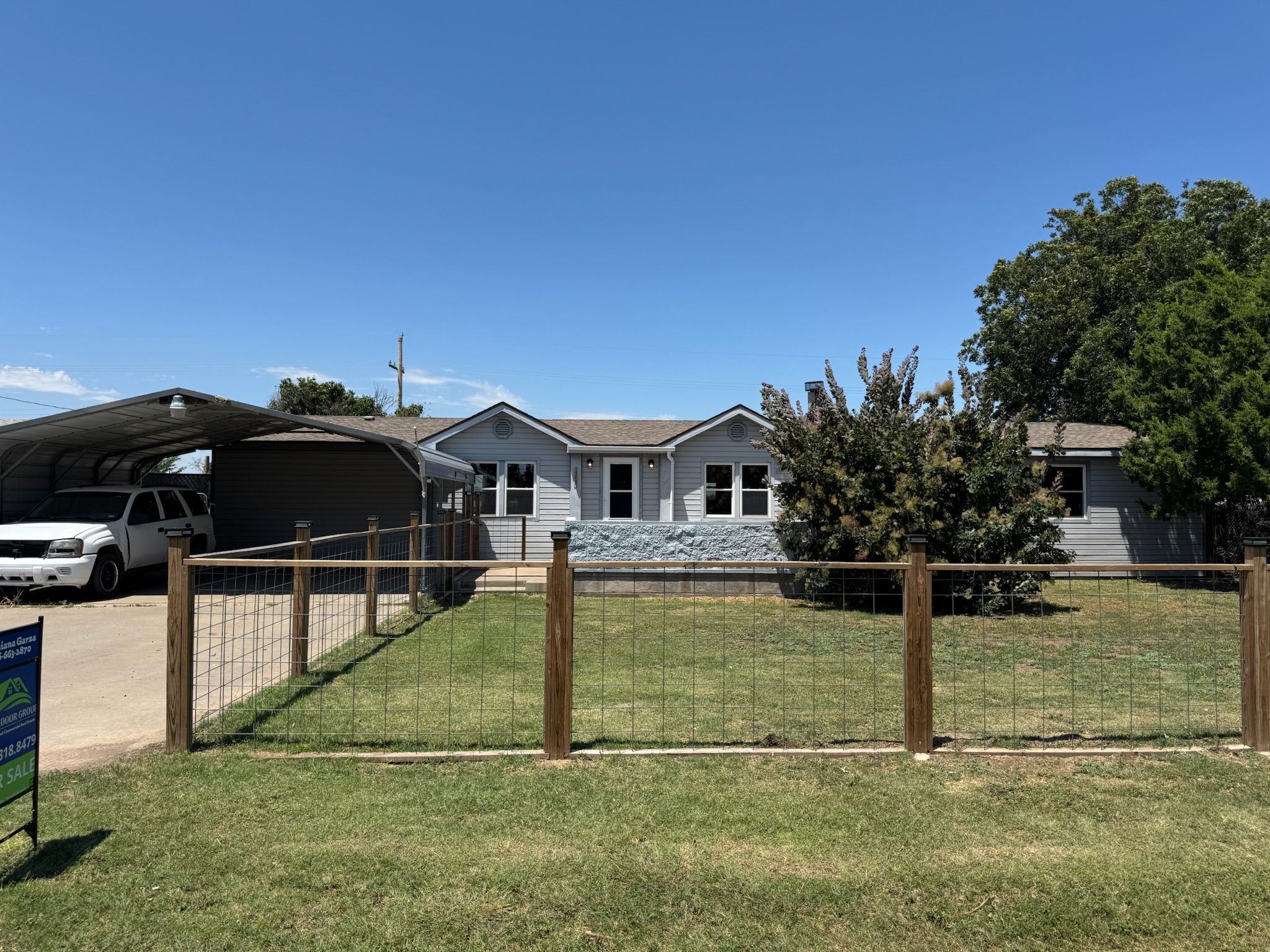 Exterior view of 403 Aaron Rd, a 3-bedroom updated manufactured home in Fritch TX near Lake Meredith, listed by Green Door Group