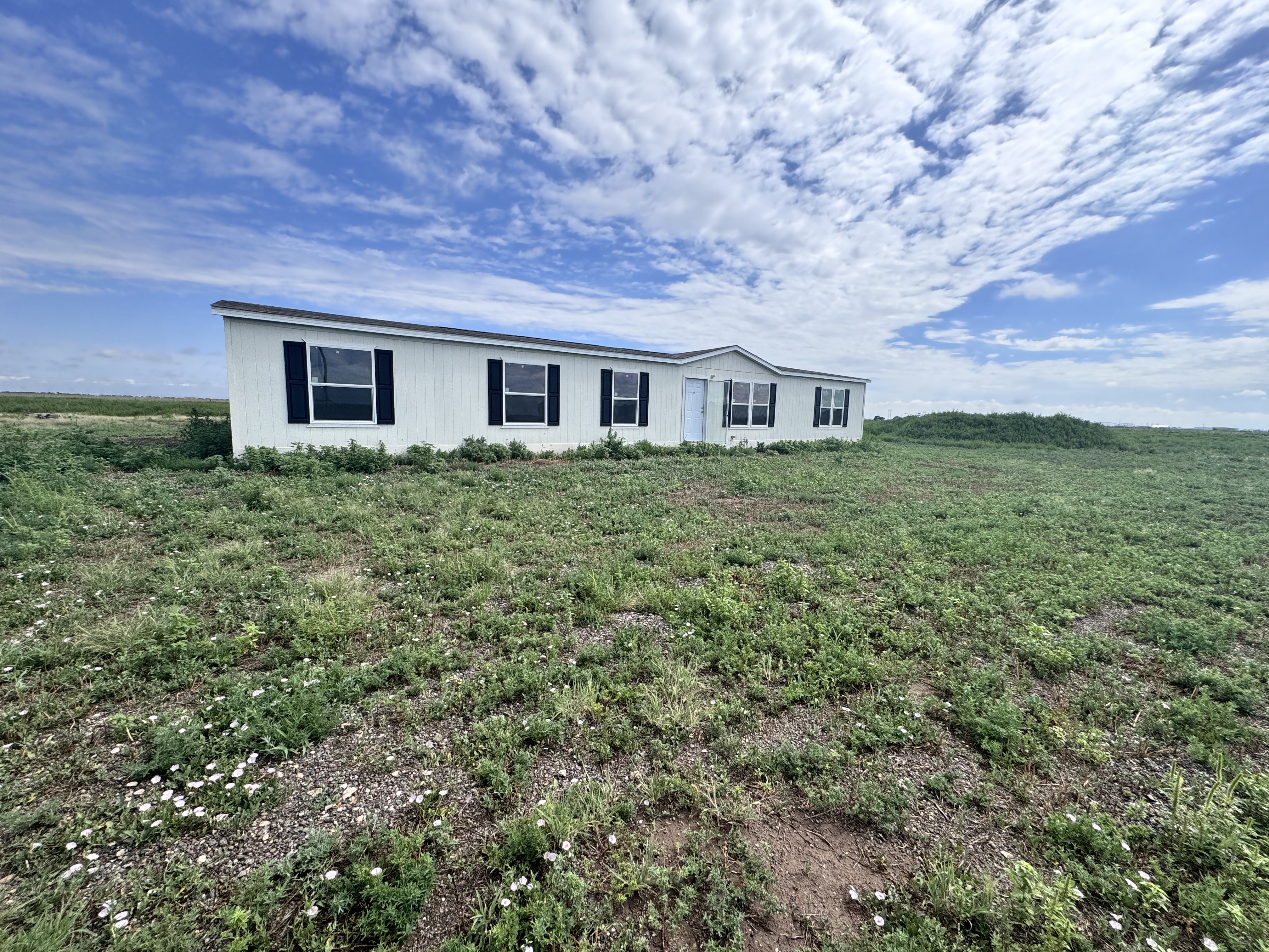 17150 Myers Ln in Amarillo, TX 79119 offers acreage and privacy near Amarillo city amenities. Listed by Green Door Group, local experts in country properties.