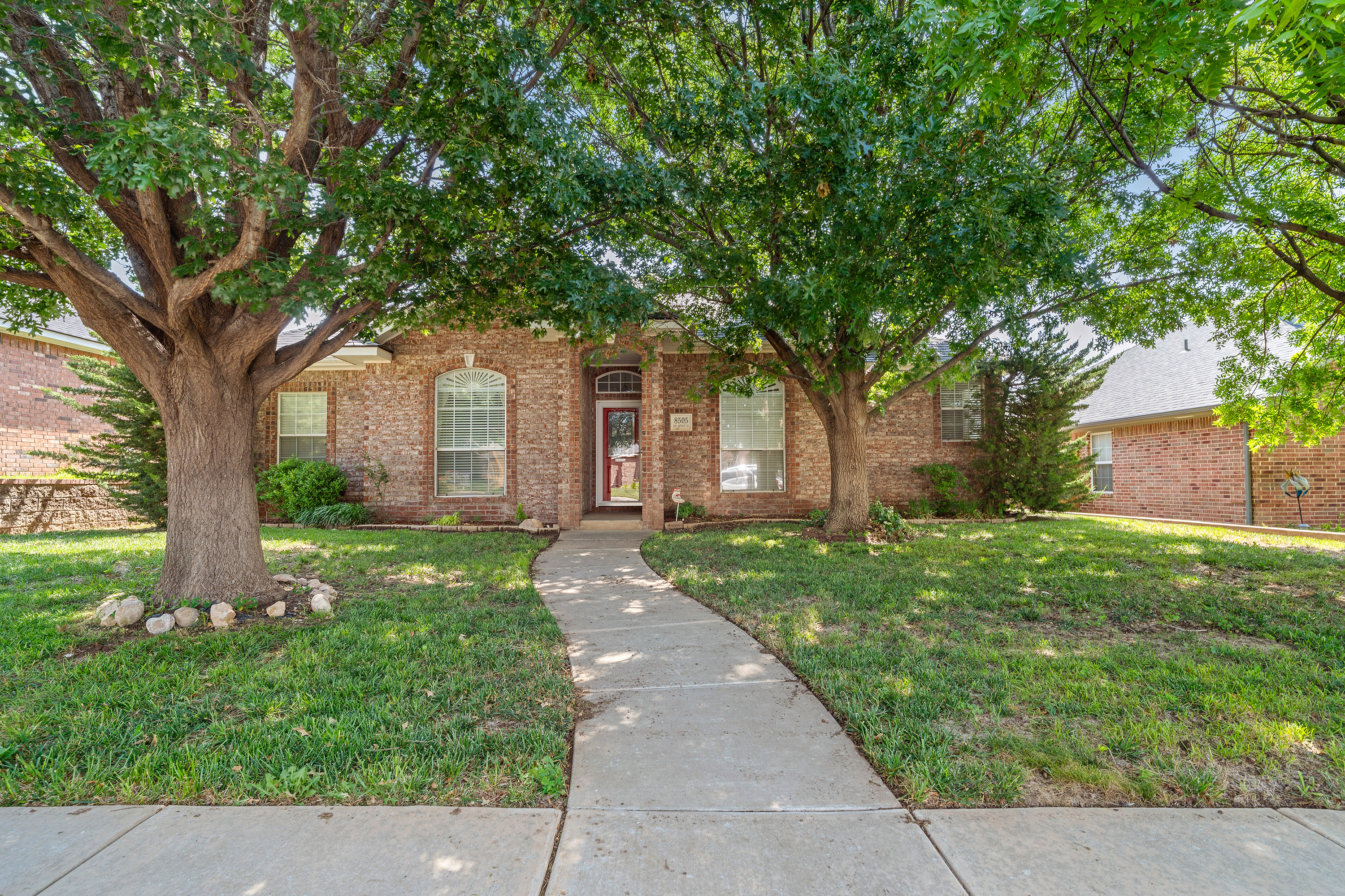 Front exterior of 8505 San Antonio Dr in Amarillo TX 79118, a 3-bedroom City View neighborhood home listed by Green Door Group