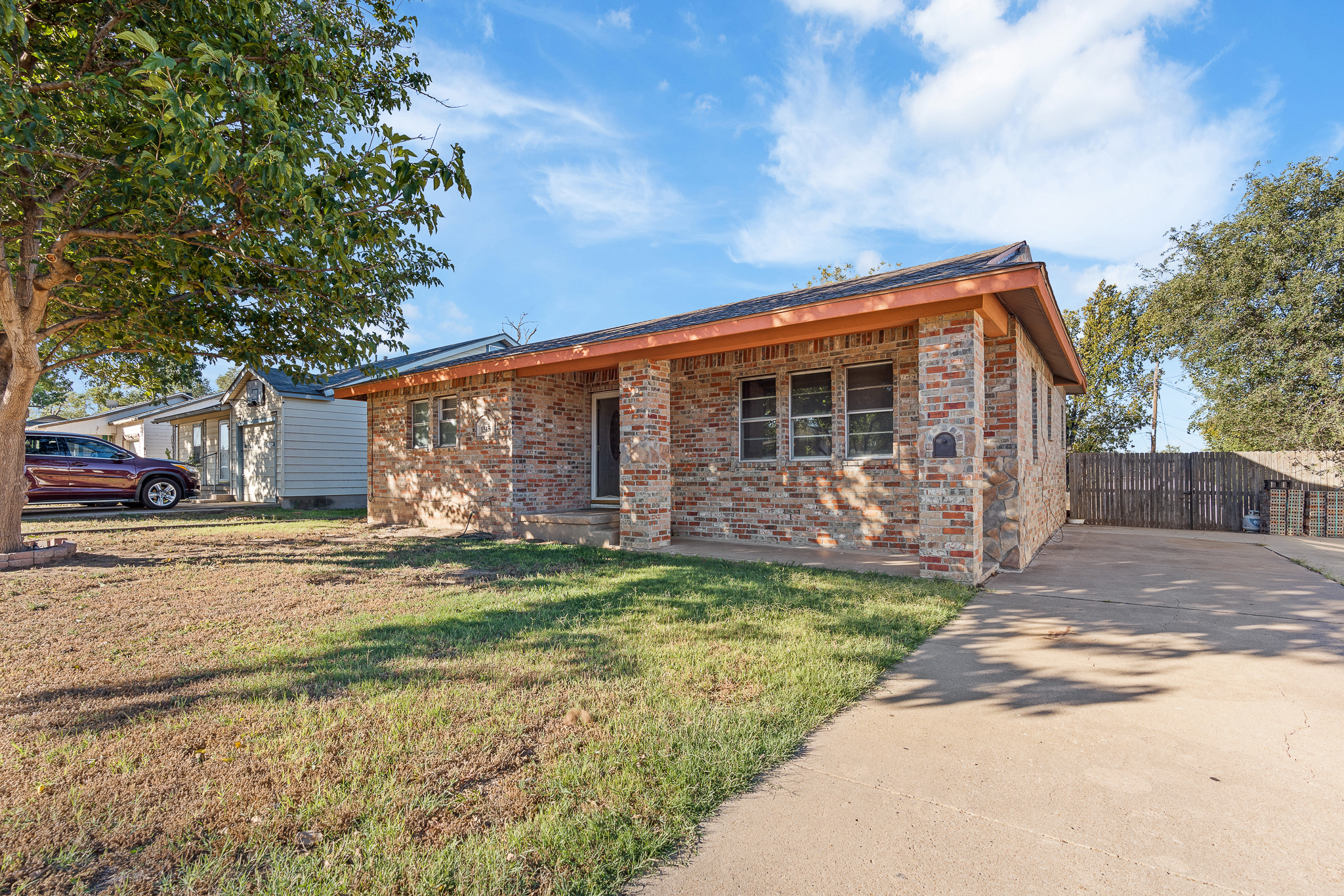 Front exterior of 1515 Birch St Amarillo TX brick home for sale by Green Door Group