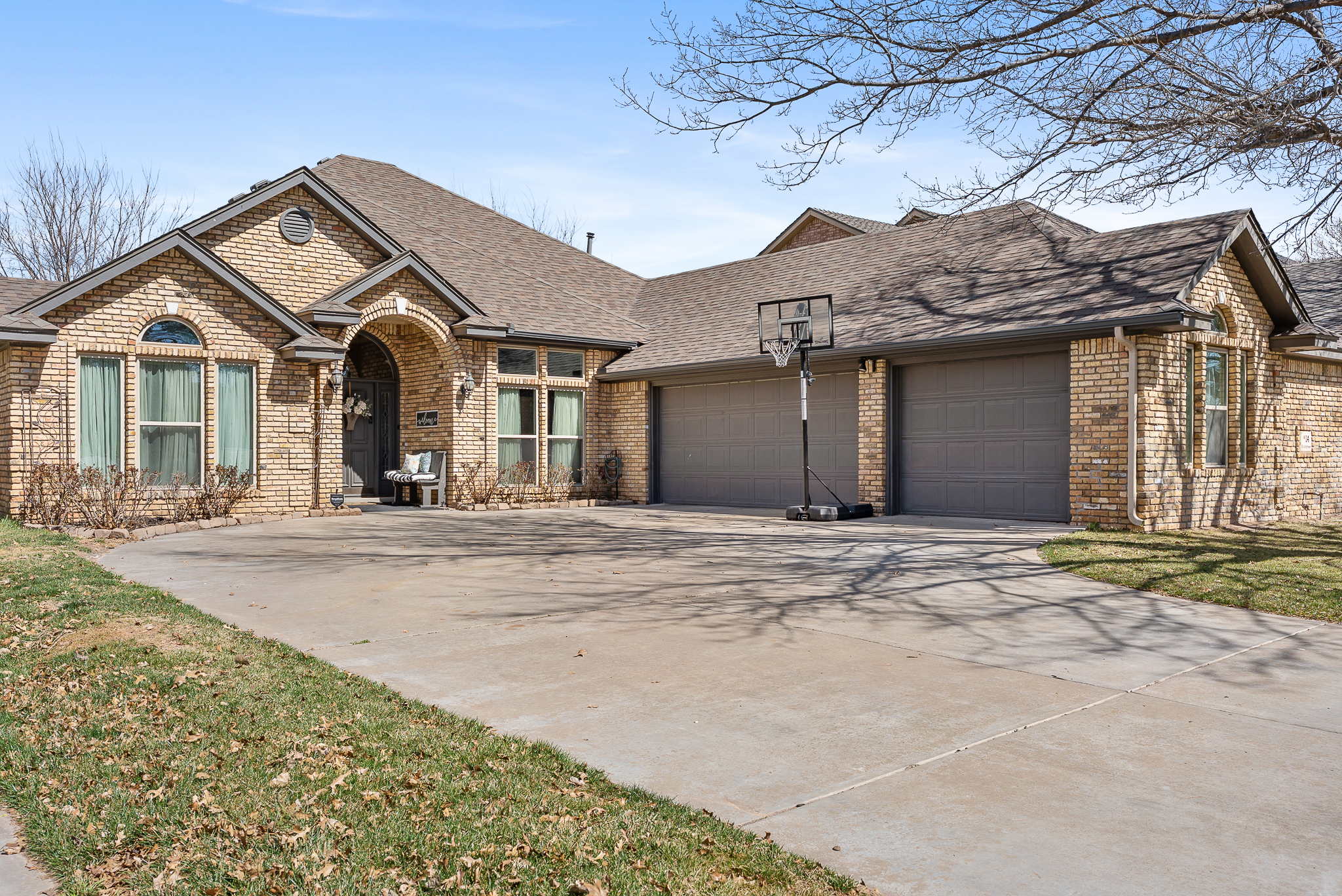 Front exterior of 14 Saint Andrews Dr Amarillo TX home for sale in west Amarillo neighborhood