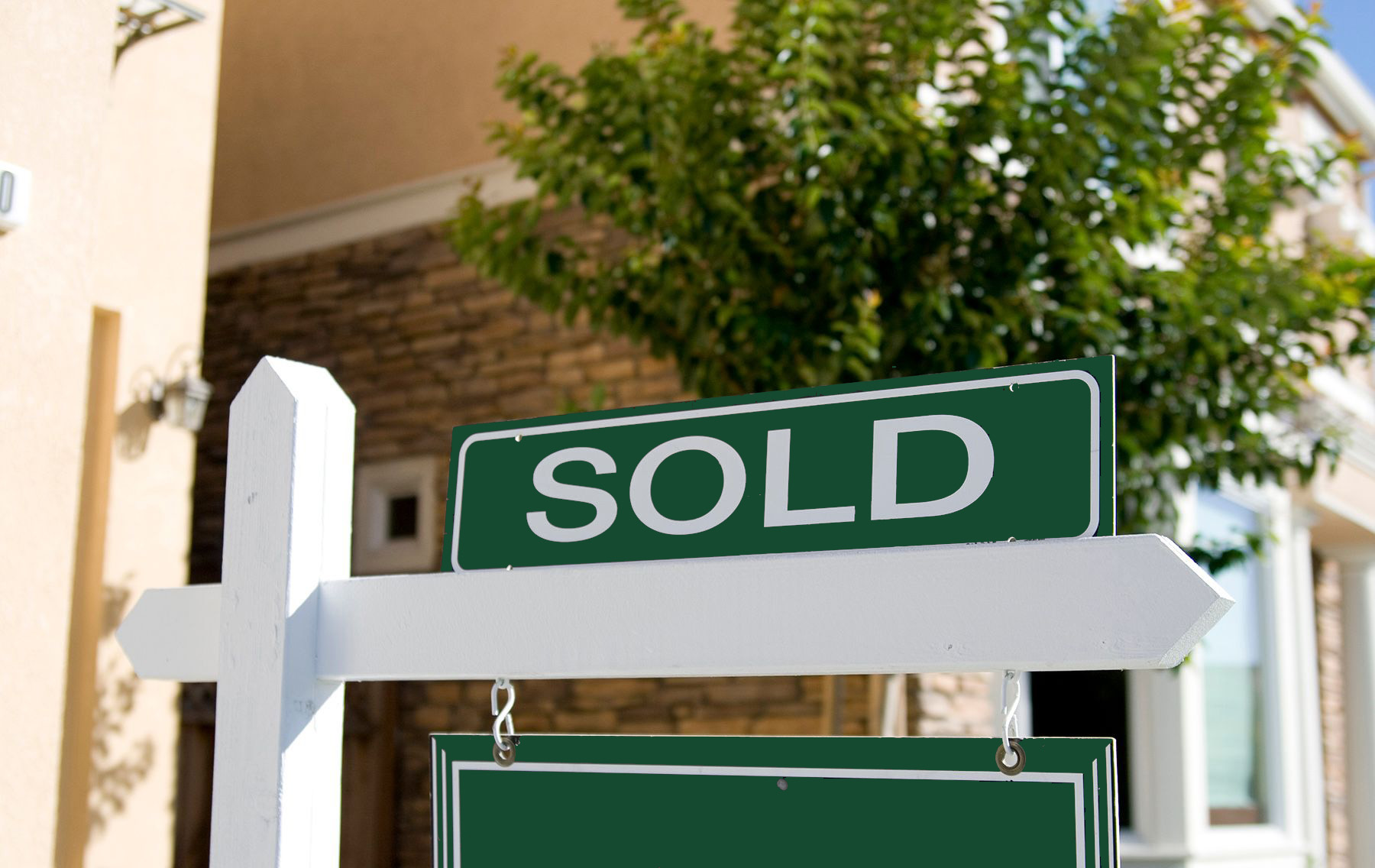 A sold sign on a Tulsa house.