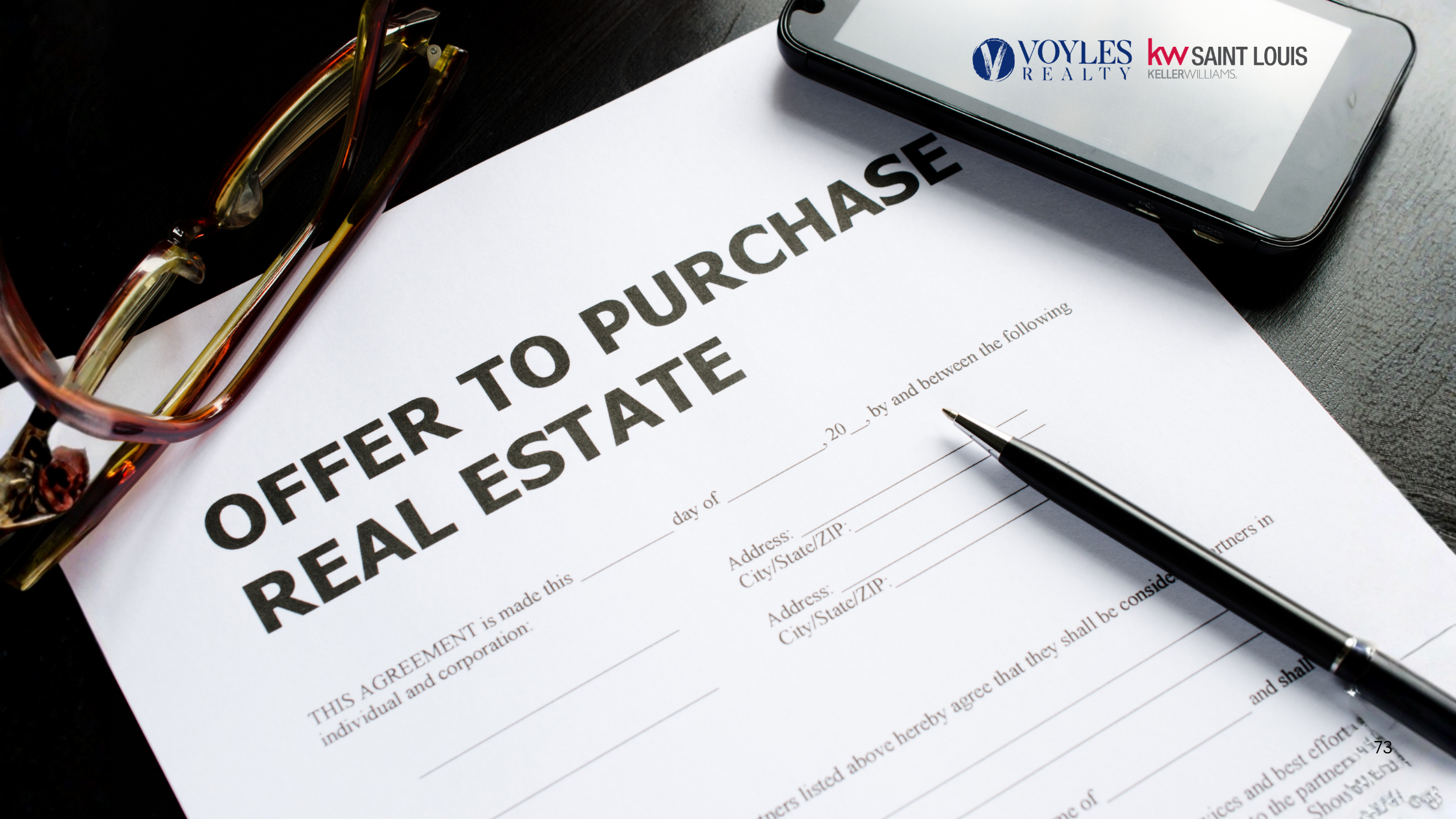 A signed real estate offer to purchase agreement document on a desk, representing a strong home buyer strategy in a competitive market.