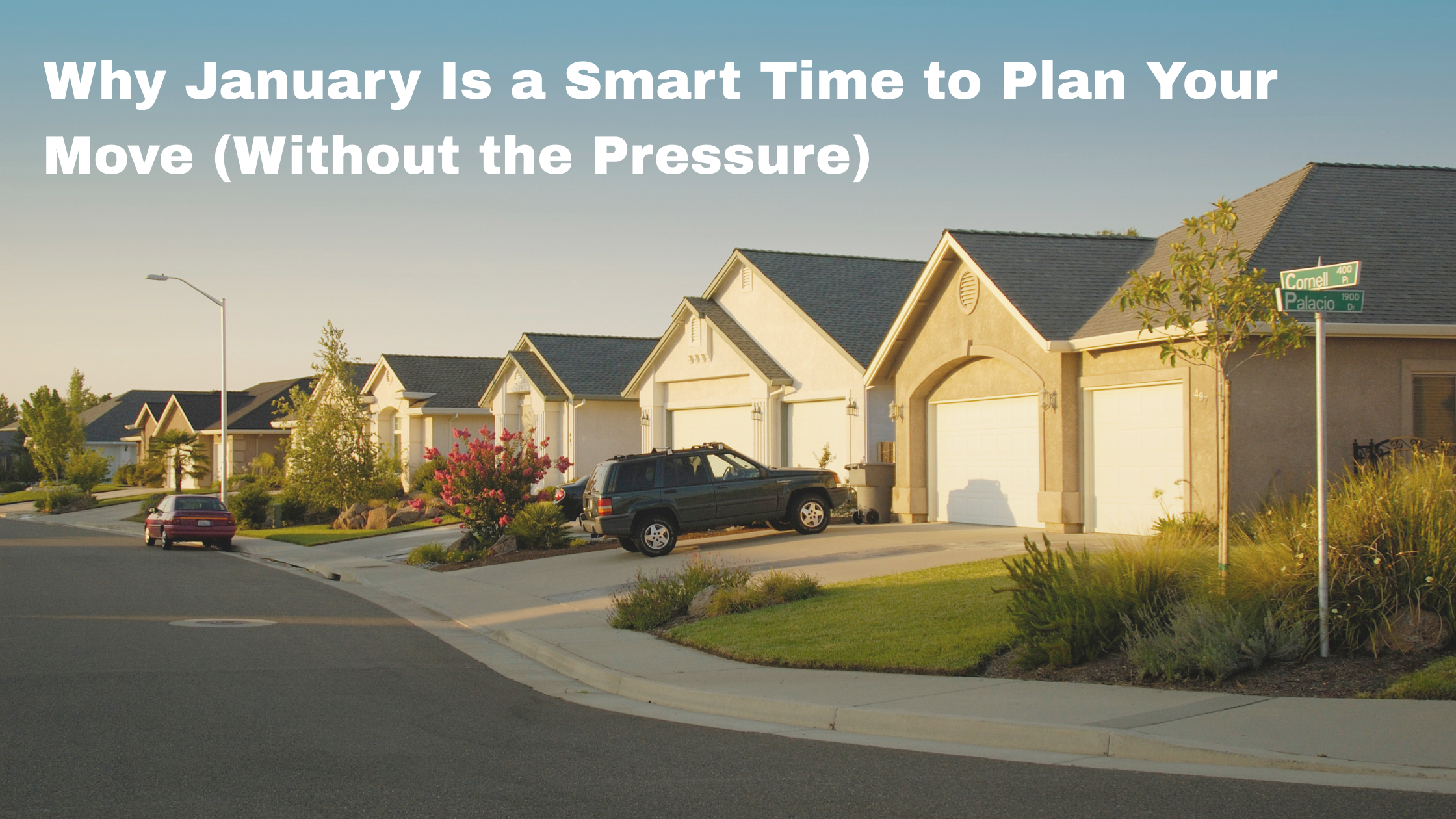 A suburban street with modern homes and parked cars during a clear day, featuring the text: Why January Is a Smart Time to Plan Your Move (Without the Pressure).