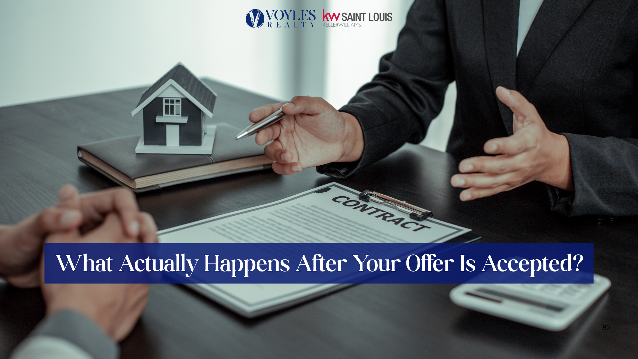 A real estate agent explaining a contract to a client at a desk with a small model home, featuring text that reads: What Actually Happens After Your Offer Is Accepted?