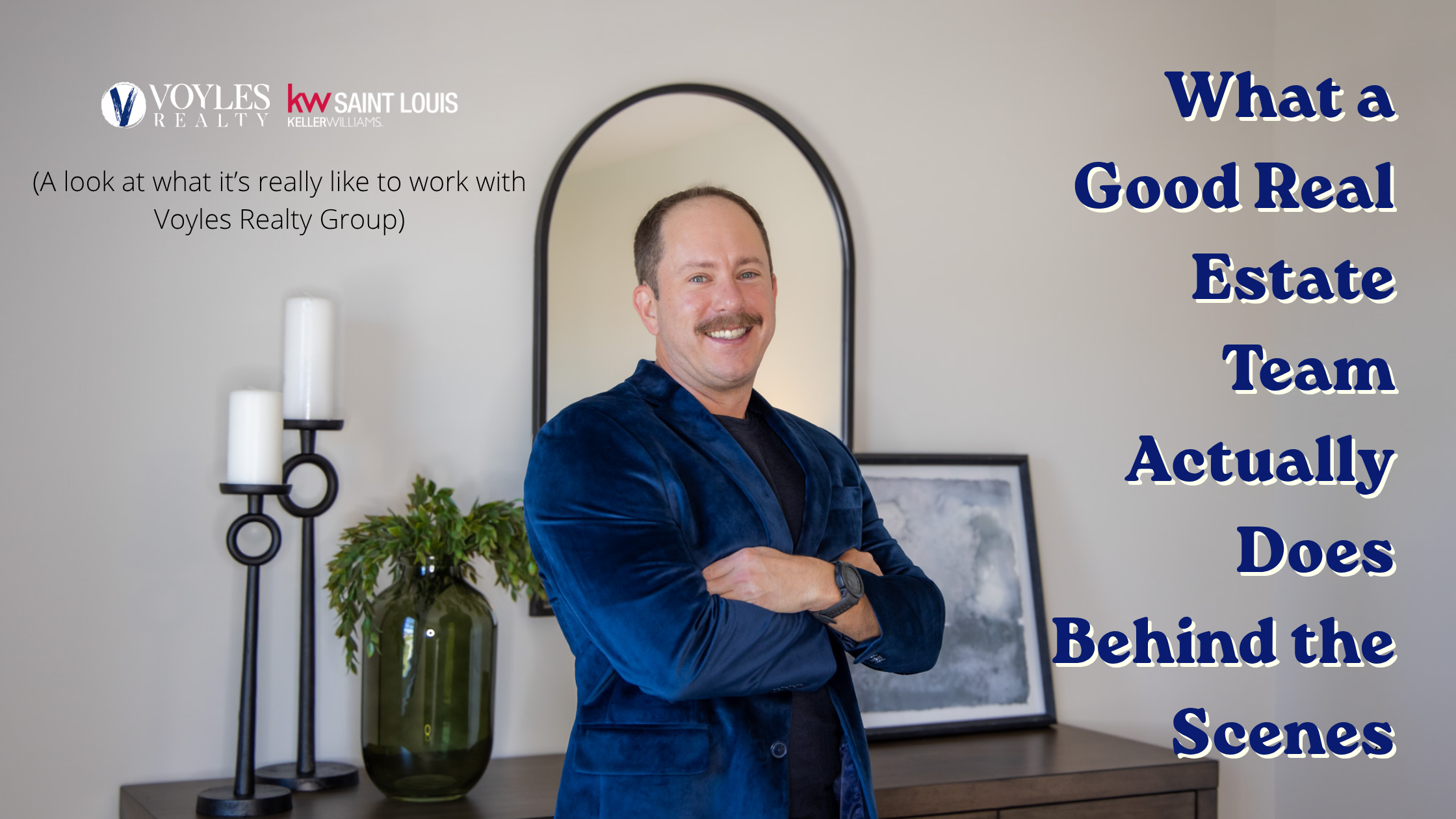 A professional portrait of a smiling man with a mustache in a blue velvet blazer, standing in a modern home office. The banner features the Voyles Realty Group and KW Saint Louis logos, with the blog title: 