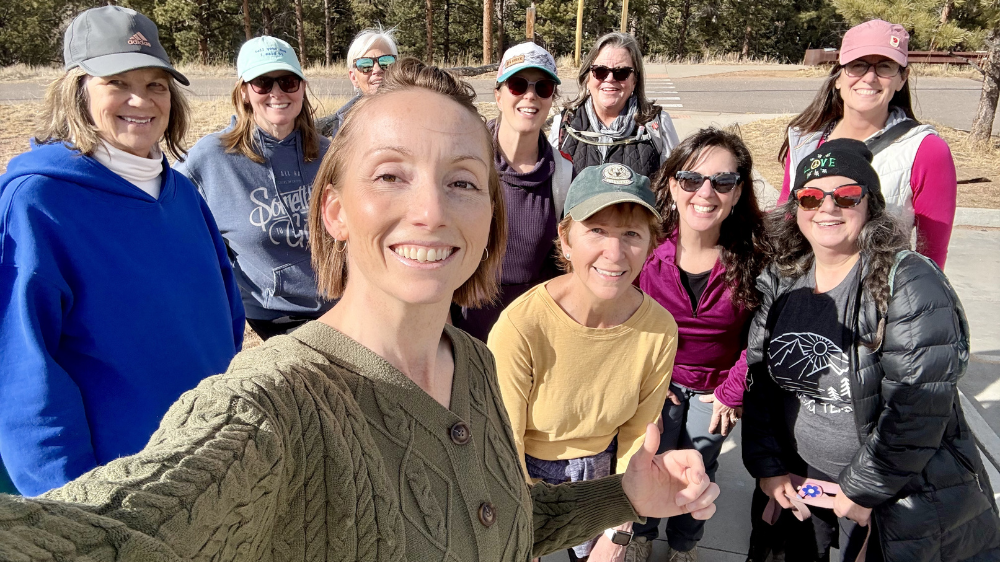 A group of women posing for an image for their weekly ladies walk in Colorado
