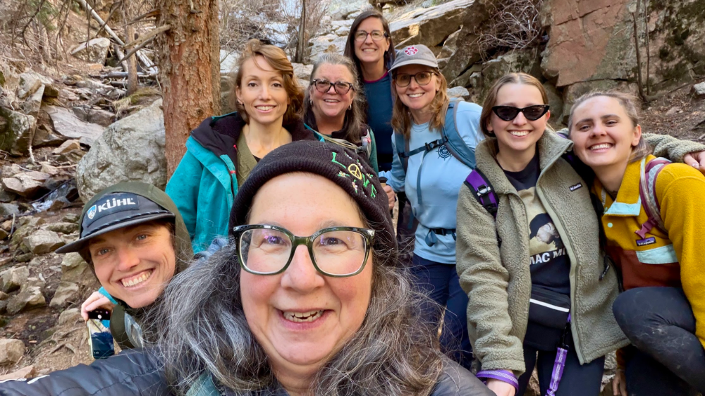 A group of Colorado ladies smiling and posing for a selfie during a Maxwells Falsl Ladies Hike