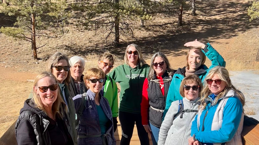 A group of women posing for an image for their weekly ladies walk in Colorado