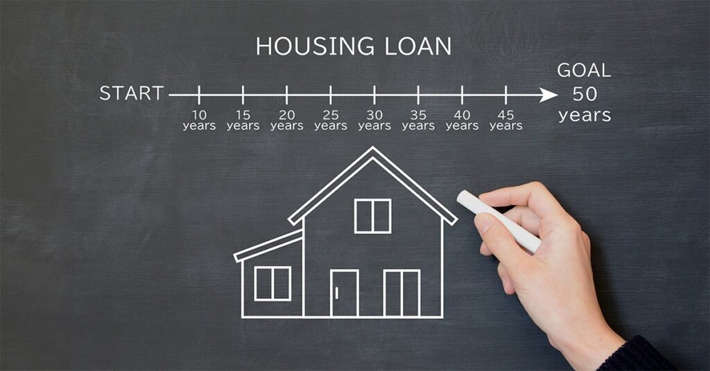 Happy homeowners exploring 50-year mortgage options with Team Ostrode Real Estate.