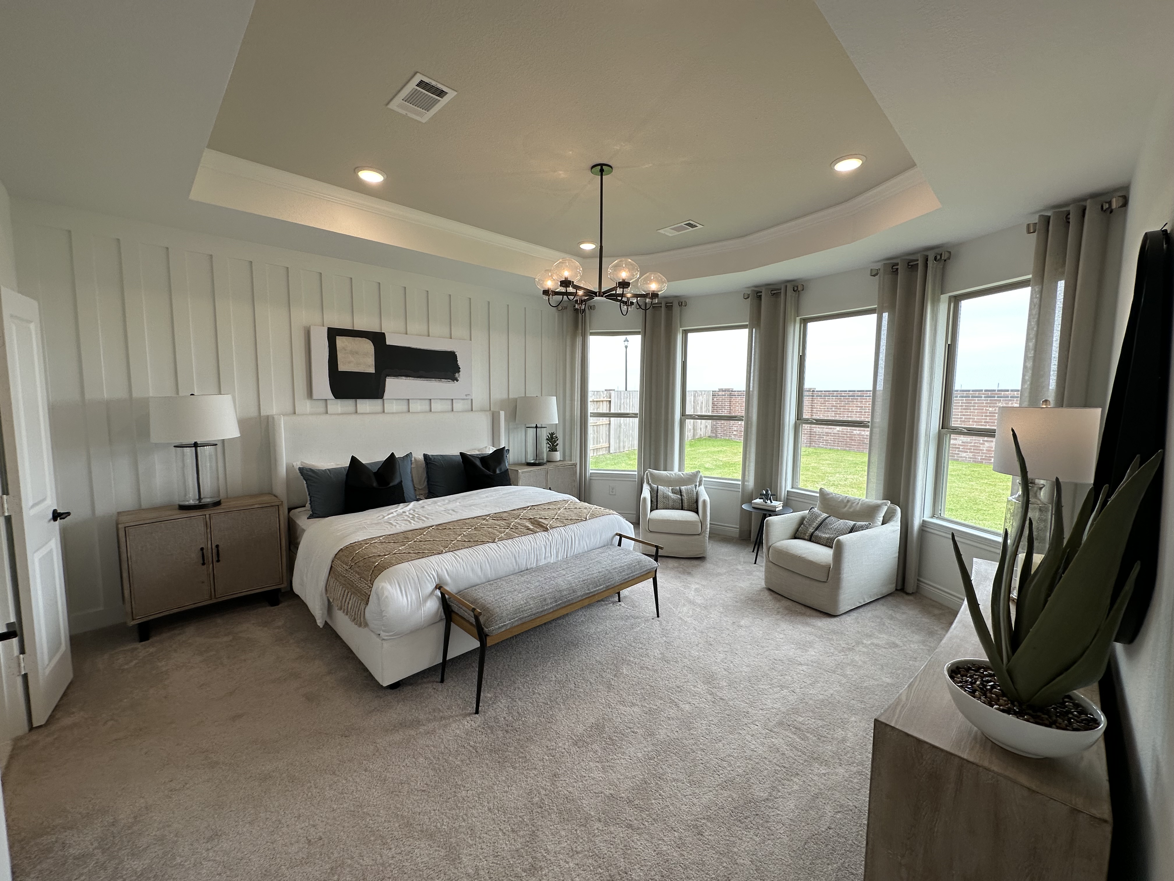A buyer touring both a newly constructed home and an established resale home in Katy, Texas, while comparing home-buying options.