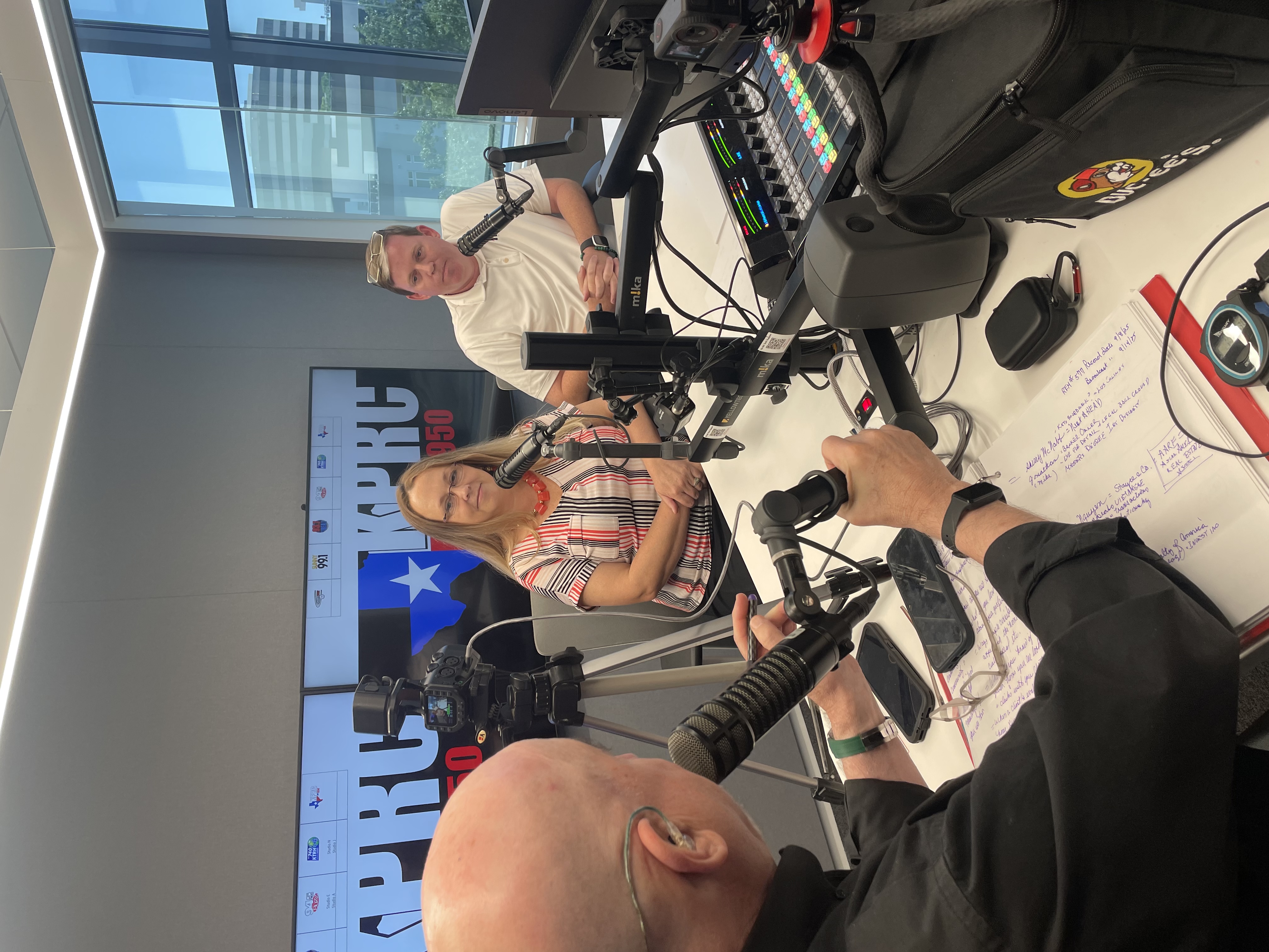 Jonathan McNabb, REALTOR®, discussing the Katy, TX real estate market during a radio interview.