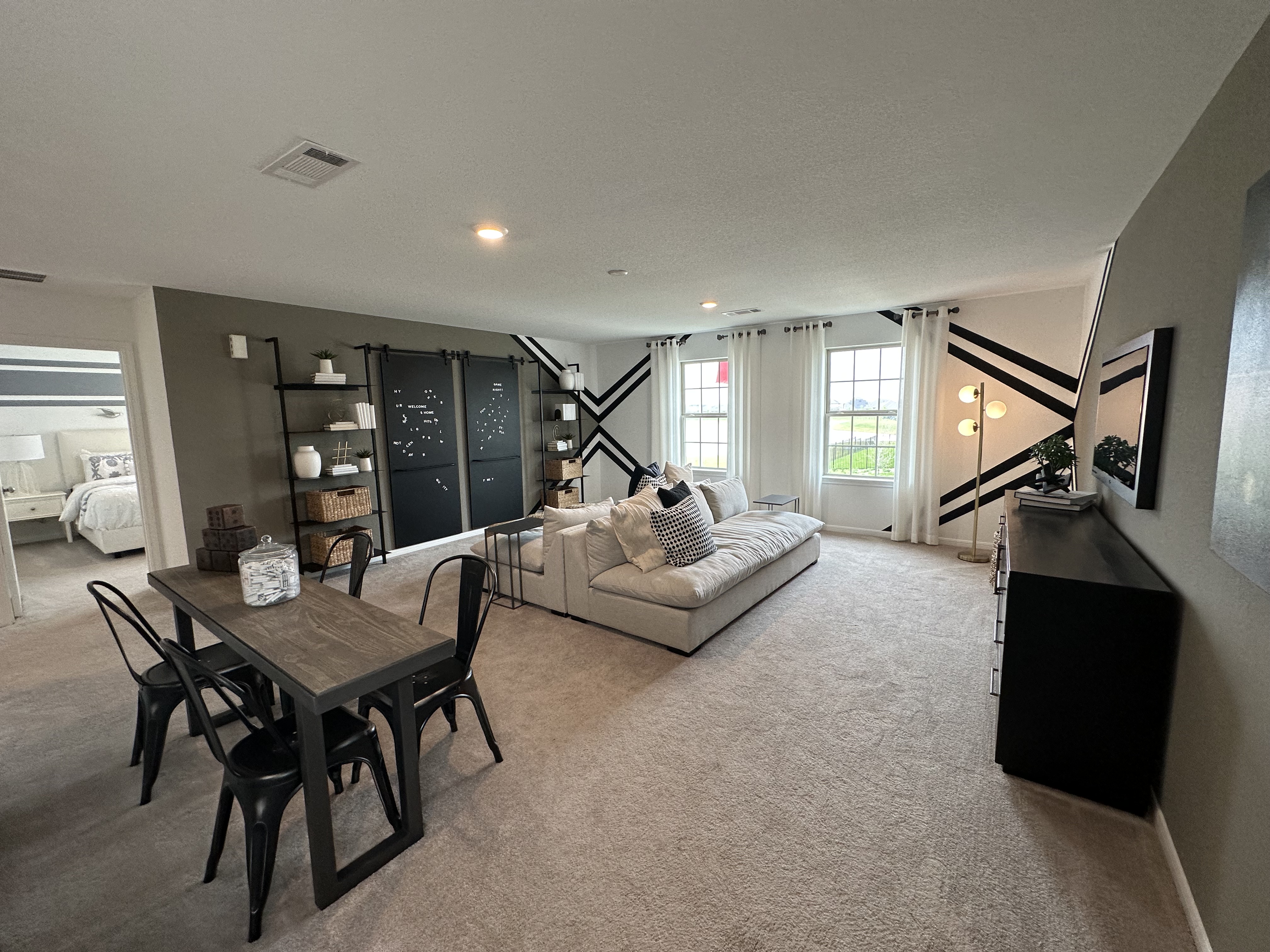 Family walking through a Katy TX neighborhood on a sunny day