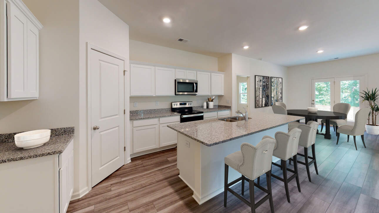 A home seller reviewing a purchase contract while discussing the option period with their REALTOR®.