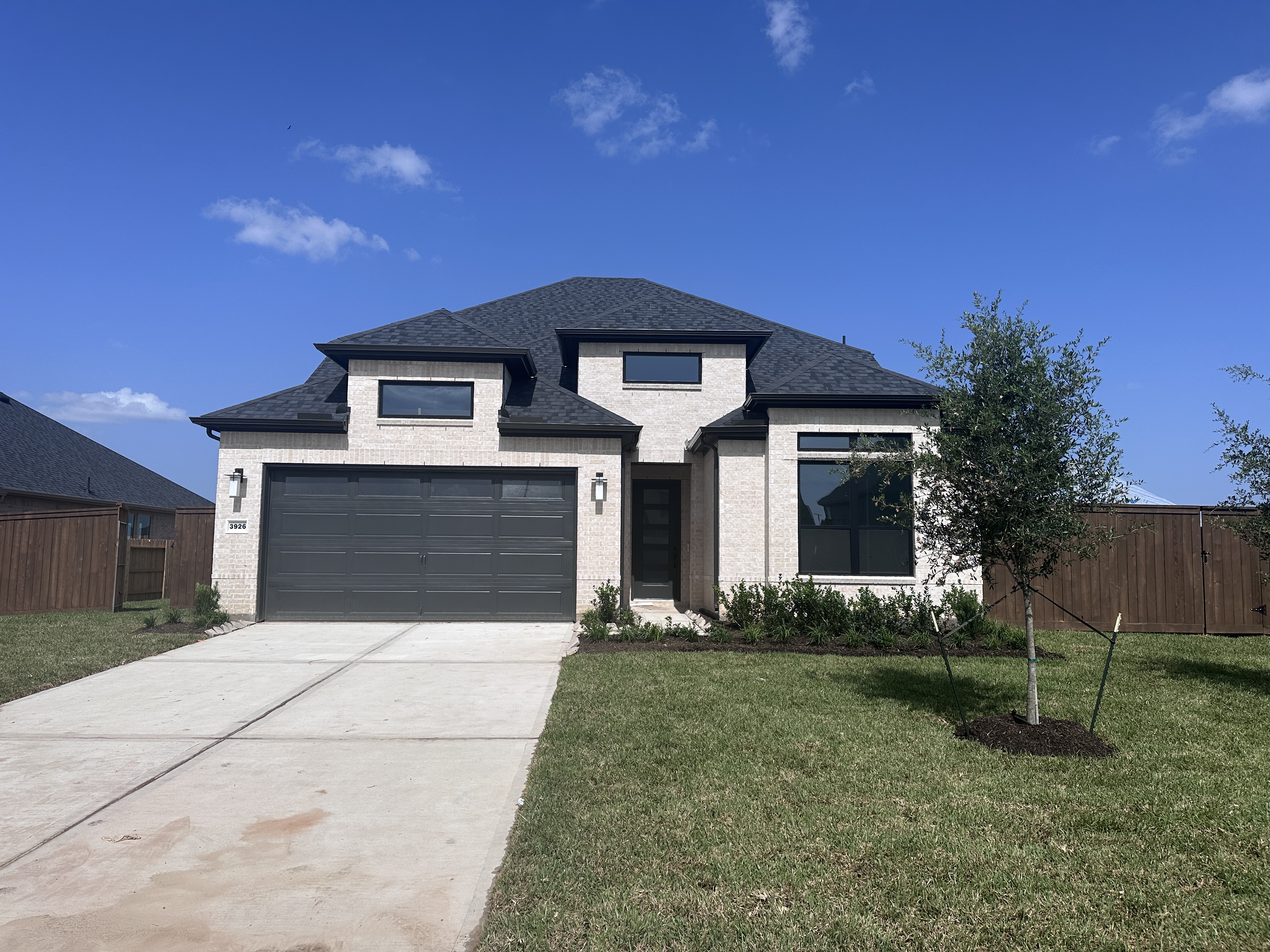 A homeowner reviewing and signing a purchase contract after accepting an offer in Katy, Texas.