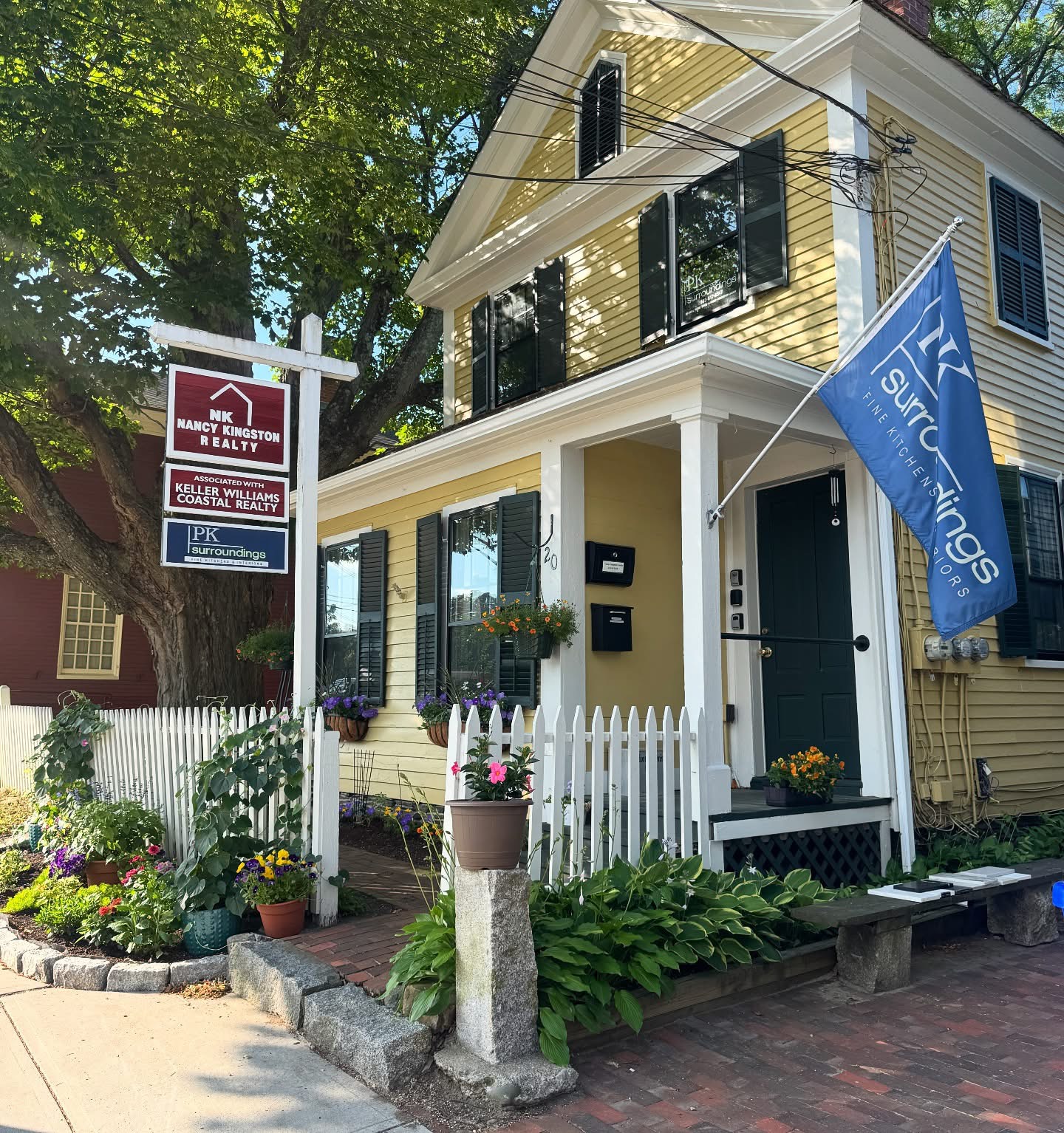 Downtown Exeter Summer Gardens & Yellow House real estate office