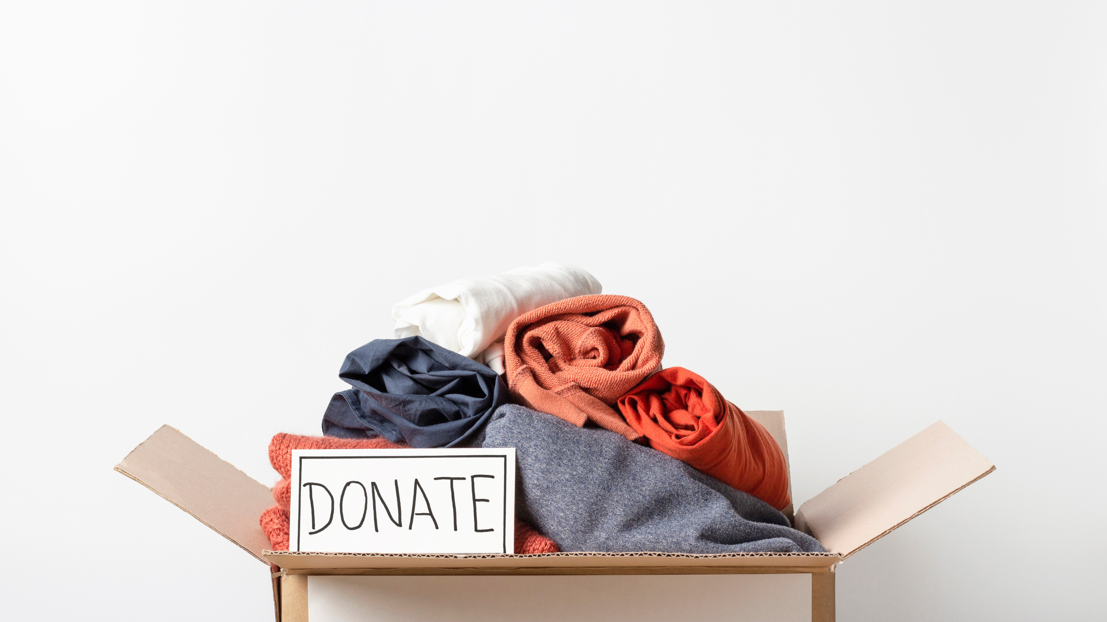 box of donations from prepping to sell home 