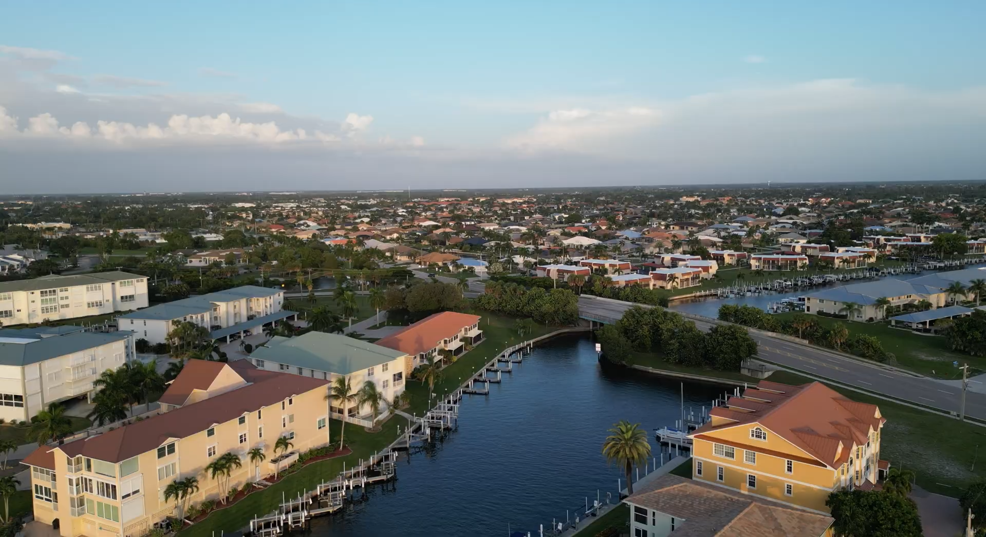 Punta Gorda historic waterfront vs Cape Coral modern canal homes, Southwest Florida real estate comparison. 