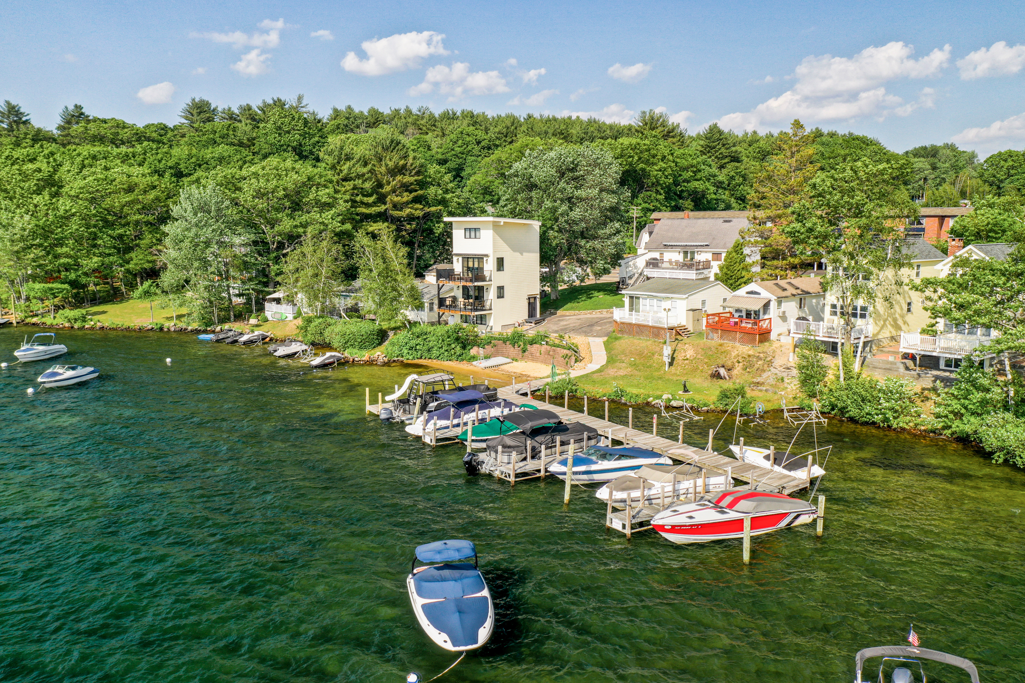 Why Summer in the Lakes Region Makes People Move Here Permanently header image.