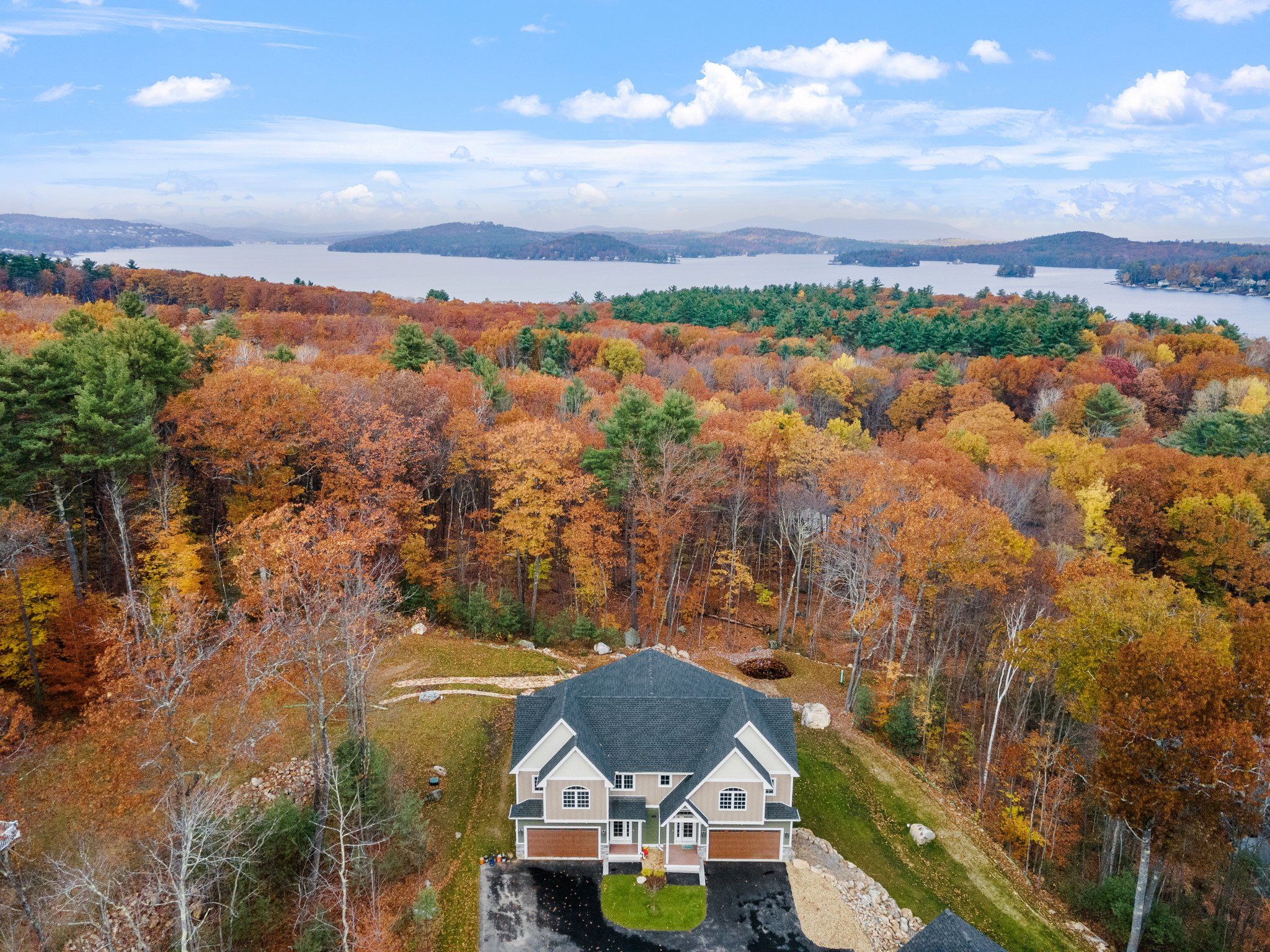 New Construction vs. Existing Homes in the Lakes Region: How to Decide. header image.