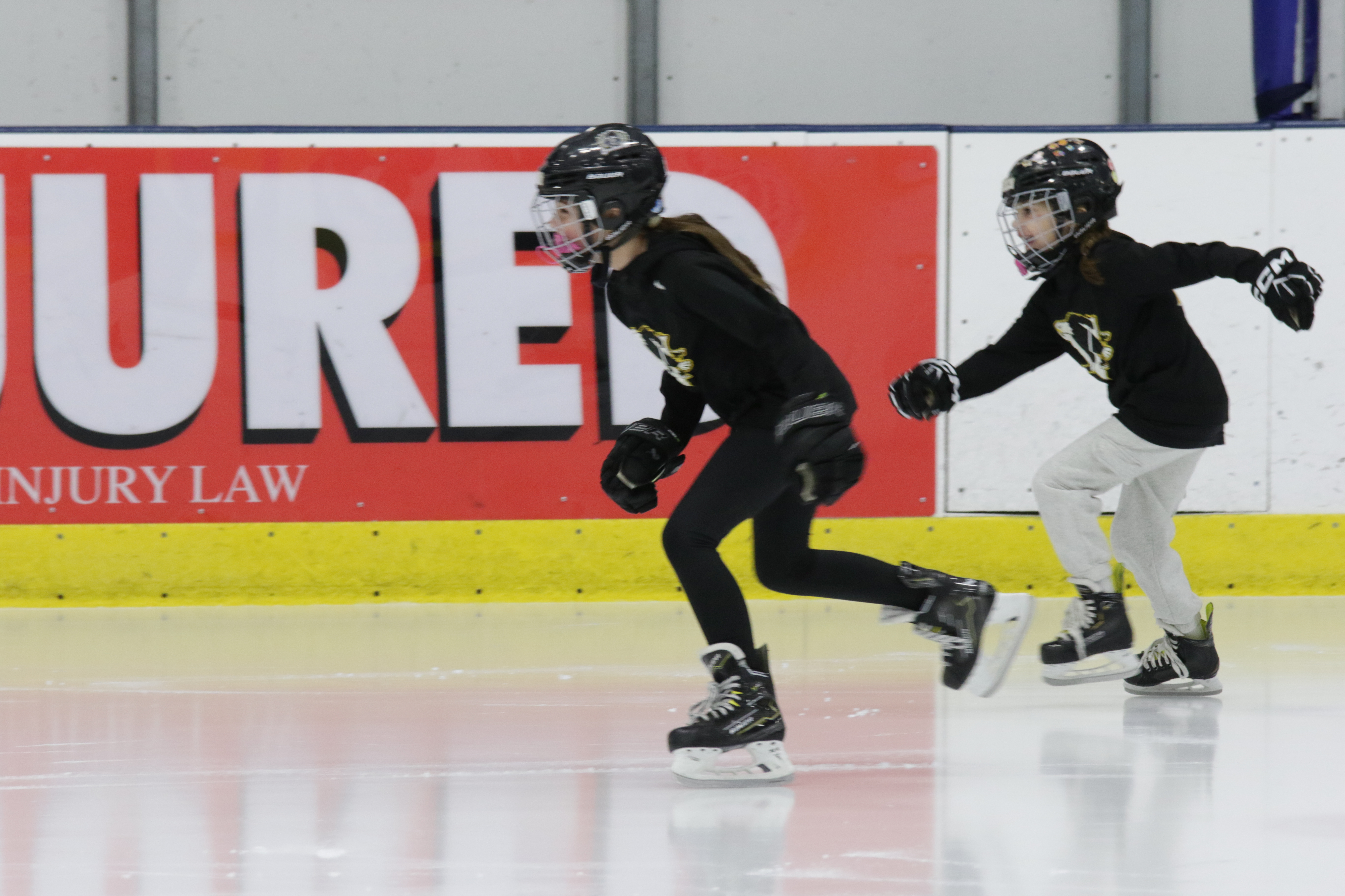 Kids ice skating at Parade Ice Gardens in Minneapolis, MN