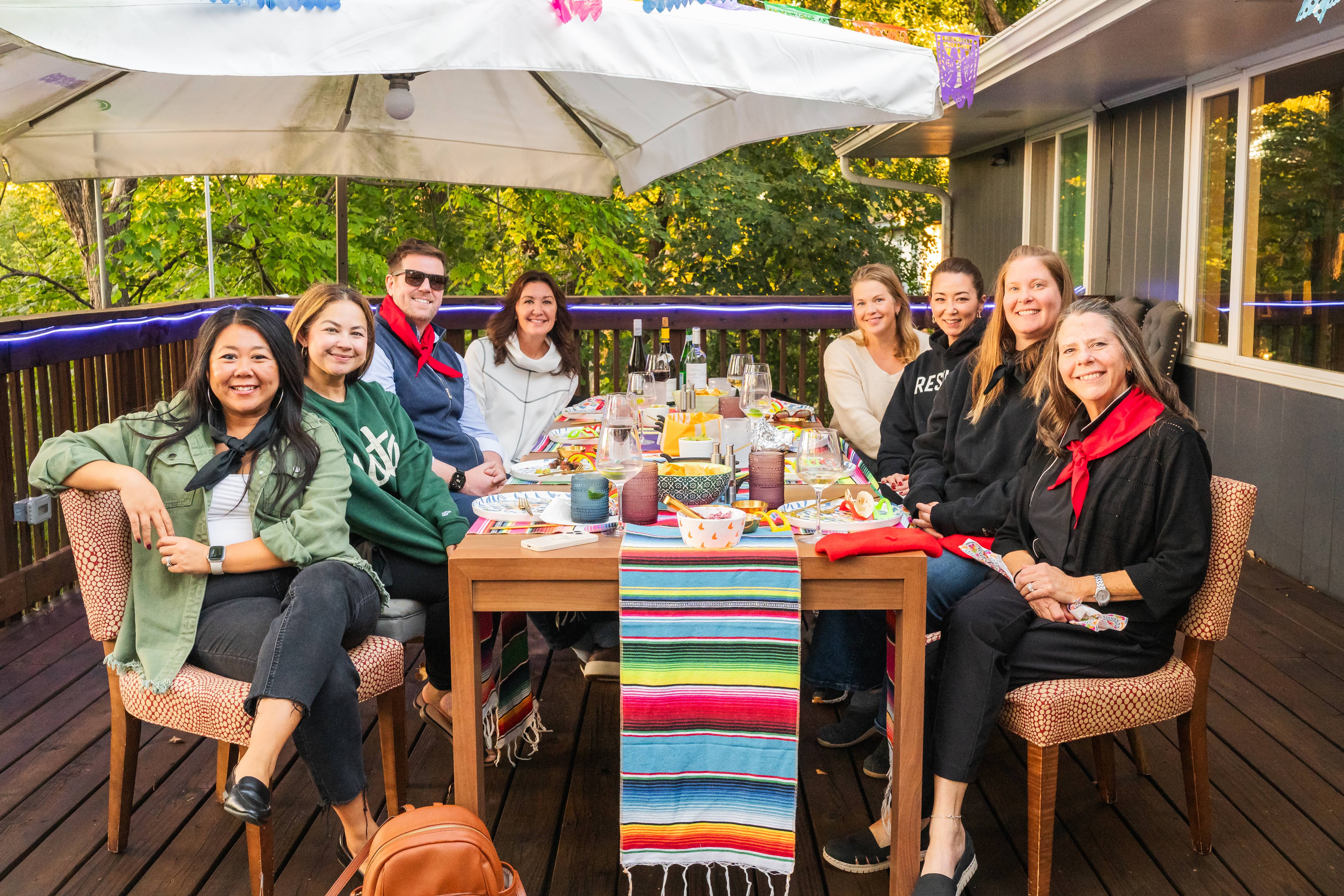 The RE/MAX Results team on the Huffman's back deck.