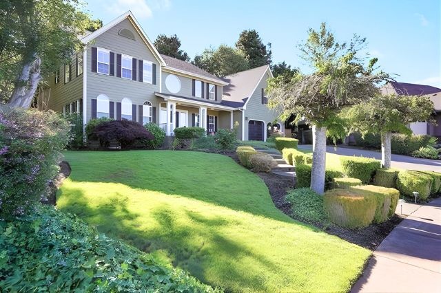 Custom home in Salem Oregon with mature landscaping and established lot
