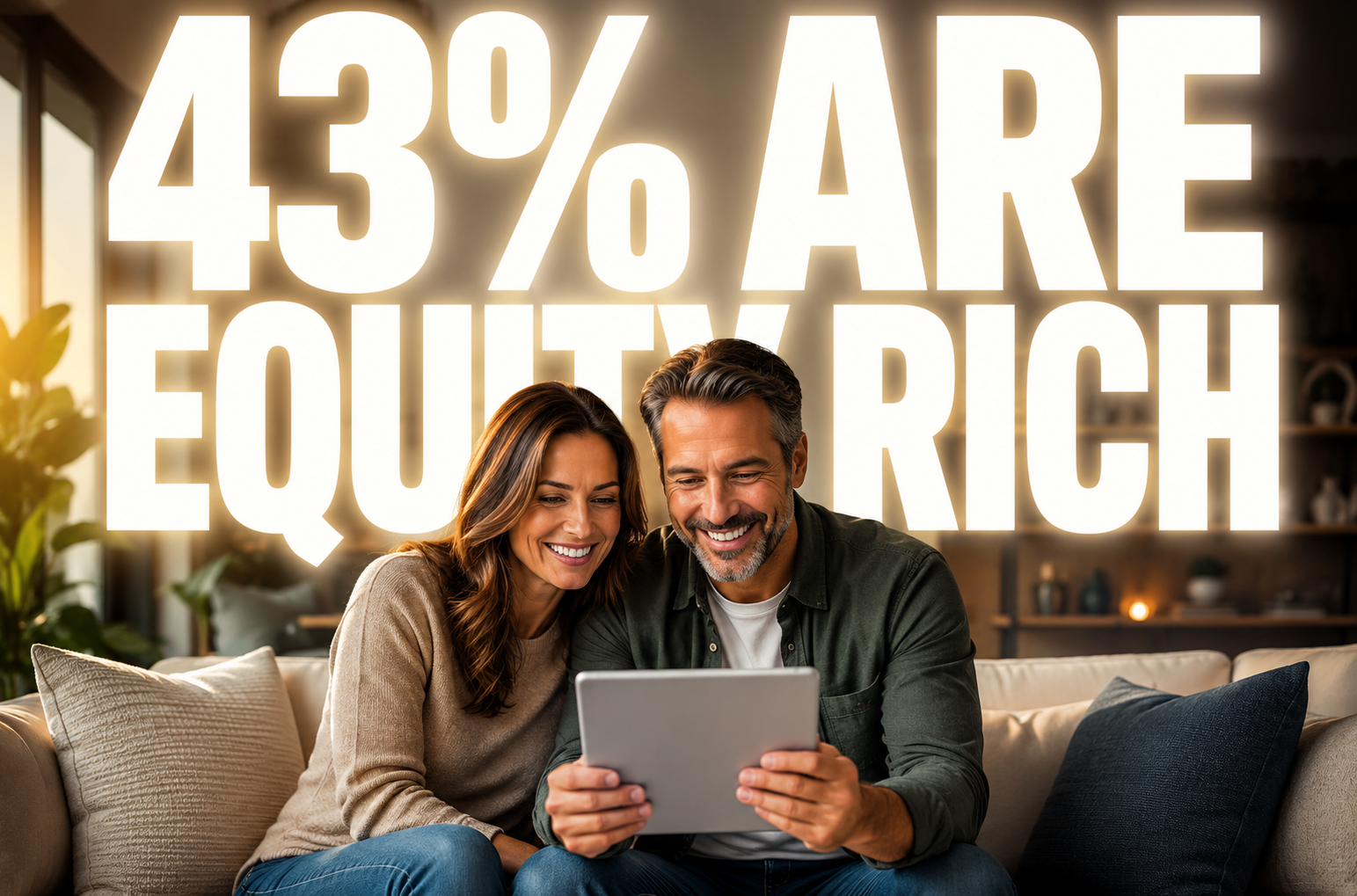Mansfield, Ohio homeowners reviewing their home equity on a tablet.