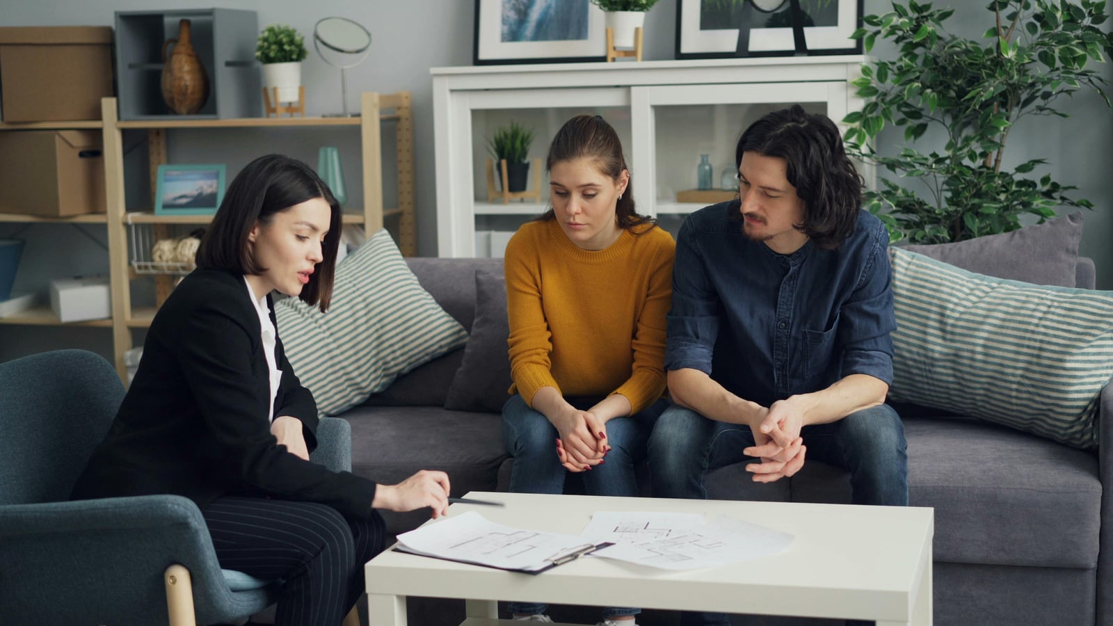 Mansfield homeowners meeting with a real estate agent to plan a home sale