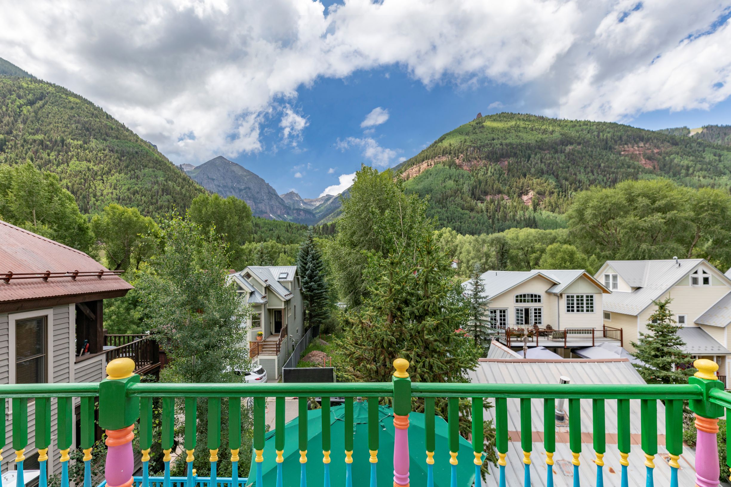 July Real Estate Numbers header image.