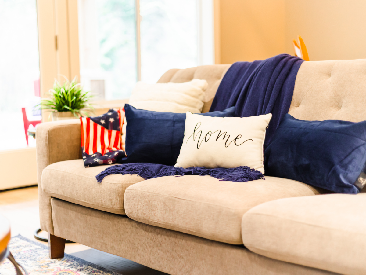 A settled living room in a Kitsap County home after a military family's PCS move.