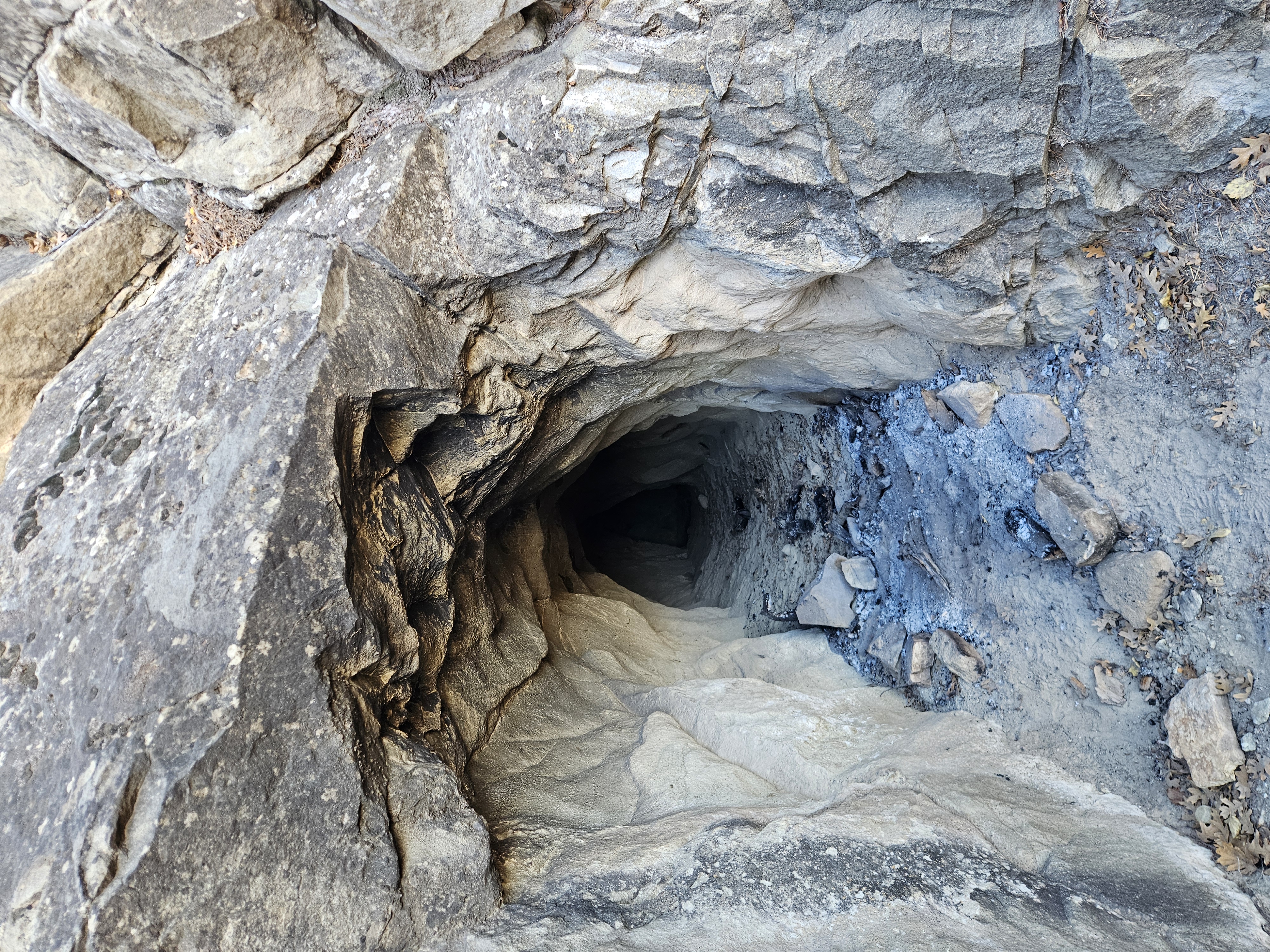 Hidden abandoned mine entrance near Right Hand Canyon called Crystal Cave in Cedar City Utah foothills