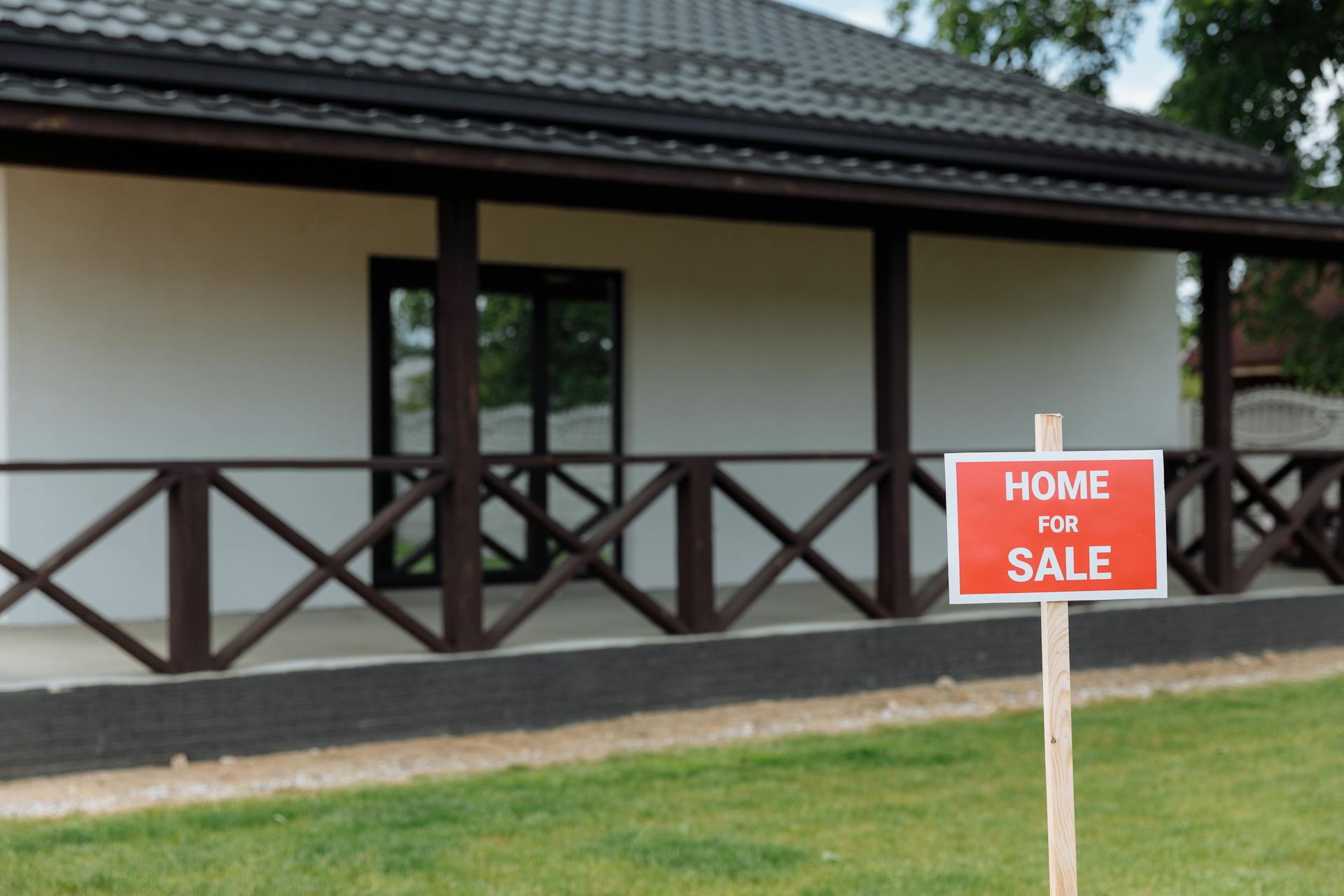 Photo by Thirdman  : https://www.pexels.com/photo/property-with-red-and-white-home-for-sale-signage-8469934/