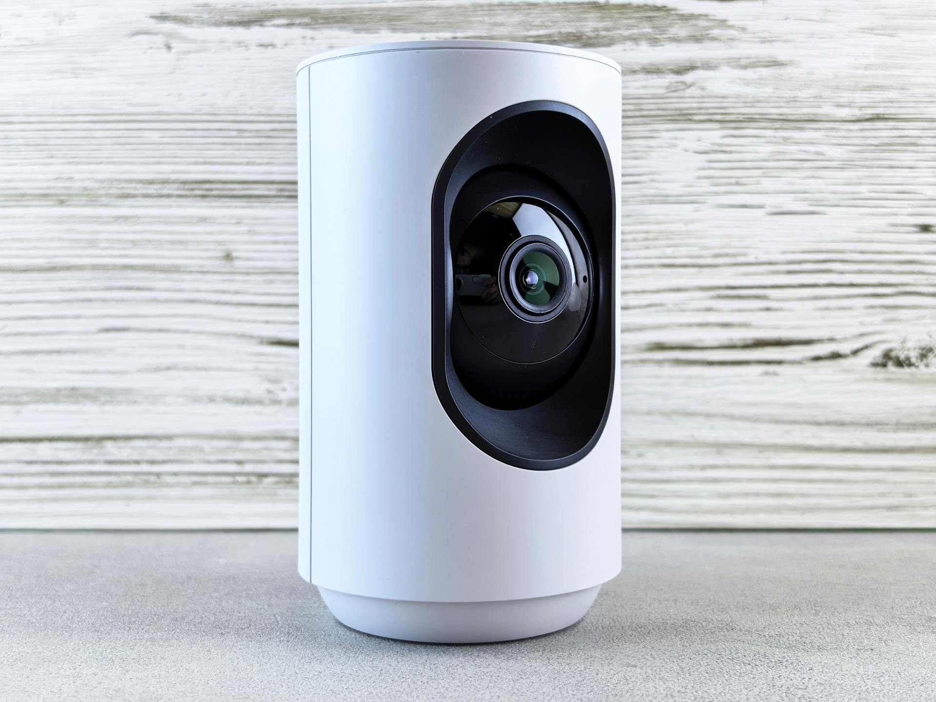 Photo by Andrey Matveev: https://www.pexels.com/photo/white-indoor-security-camera-on-wooden-surface-33104381/